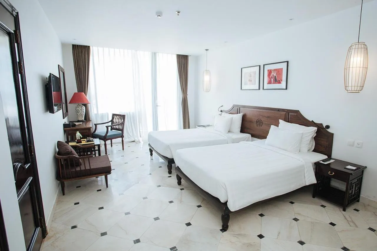 Bed in The Palmy Phu Quoc Resort & Spa