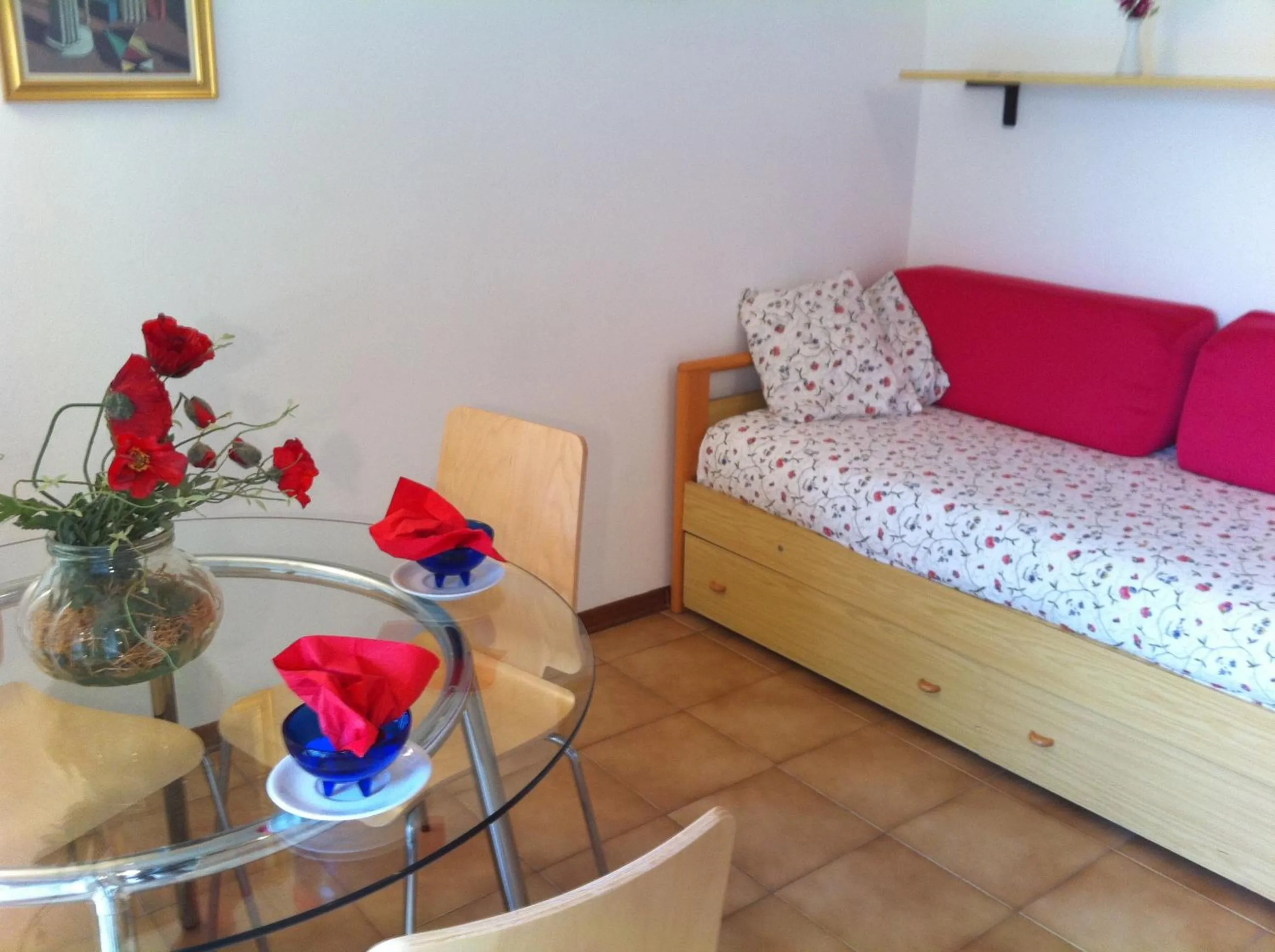 Living room, Bed in Residence Geranio
