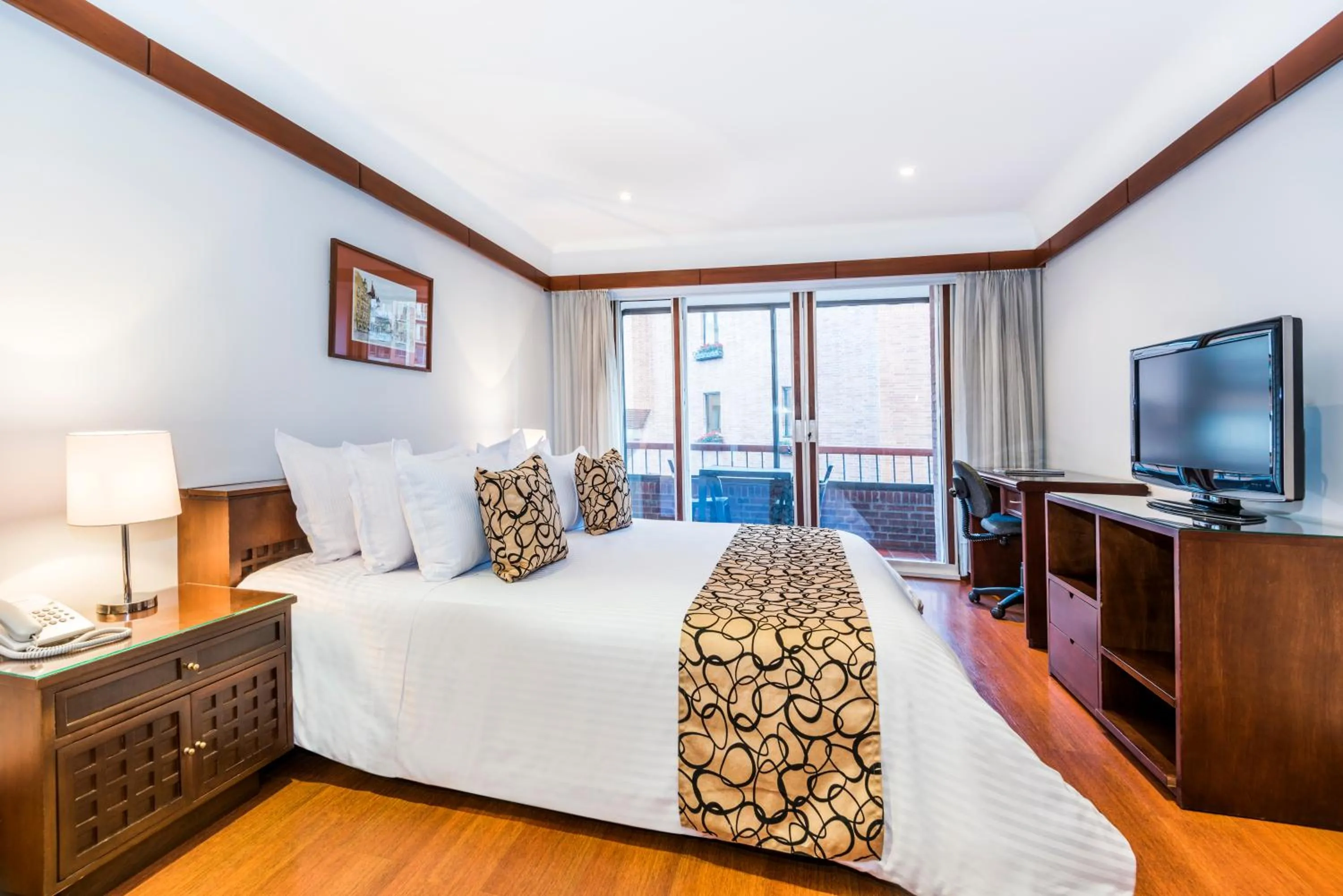 Bed in Travelers Condominio Plenitud