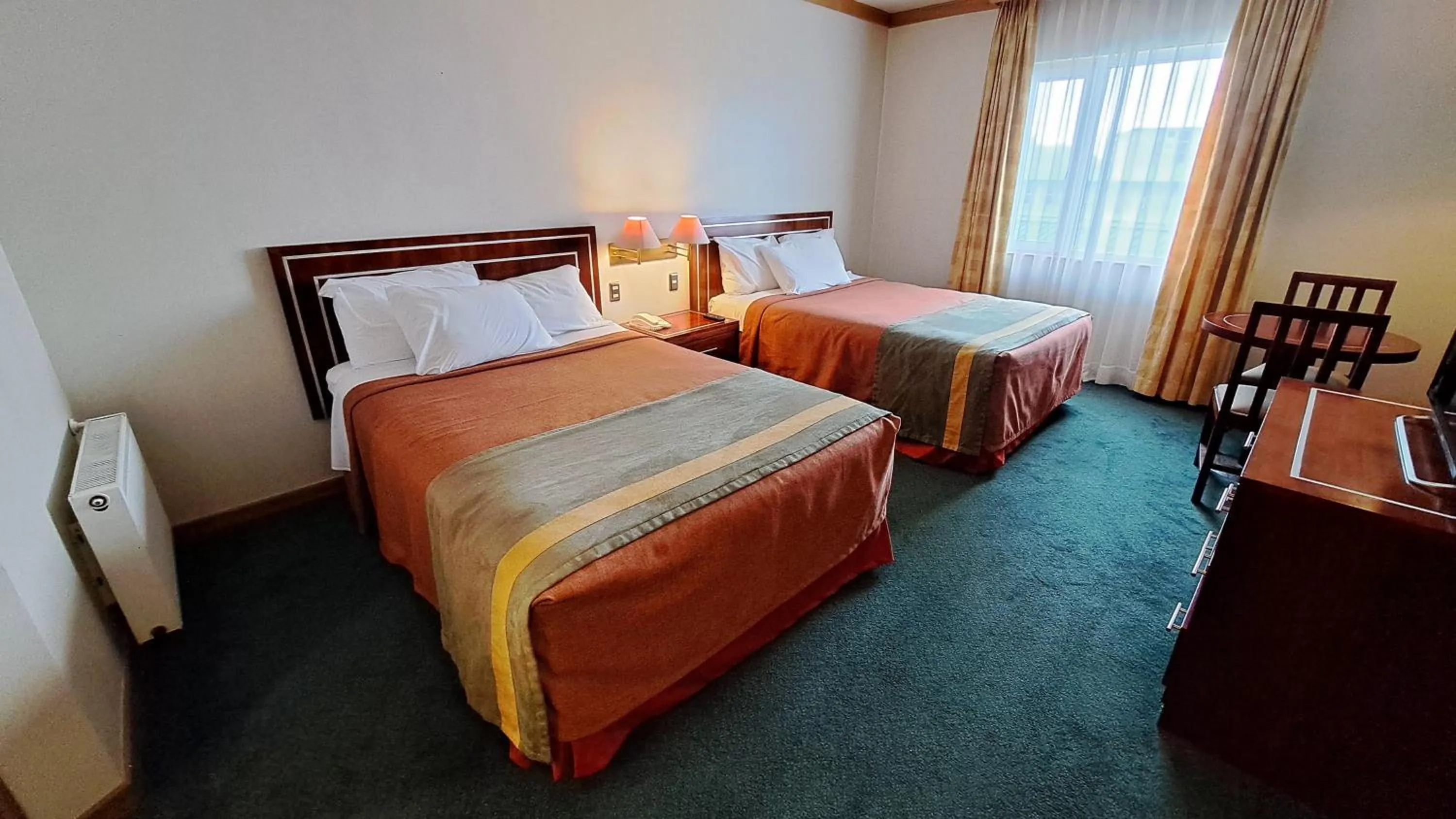 Bedroom, Bed in Hotel Diego de Almagro Puerto Montt