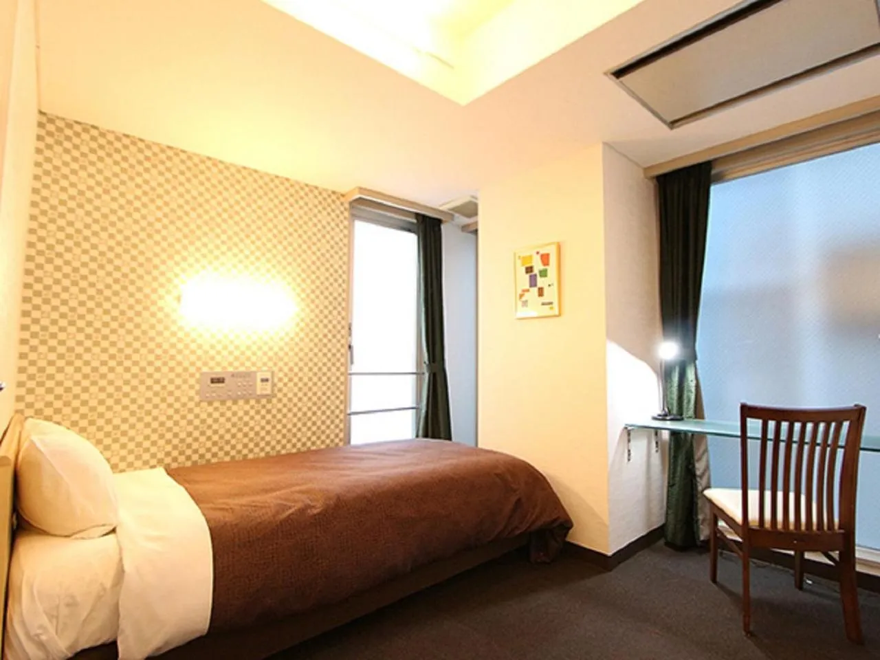 Bed in HOTEL LiVEMAX BUDGET Korakuen