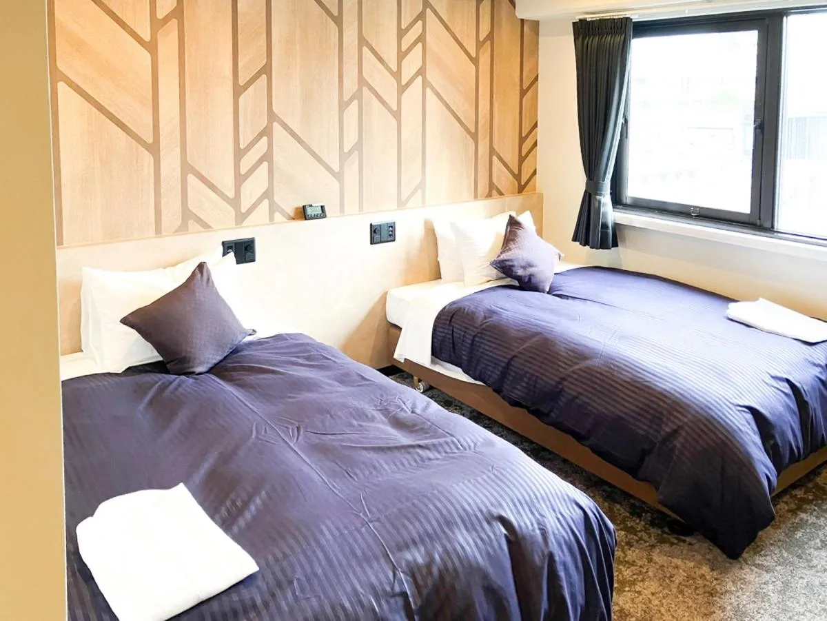 Bed in HOTEL LiVEMAX BUDGET Sagamihara