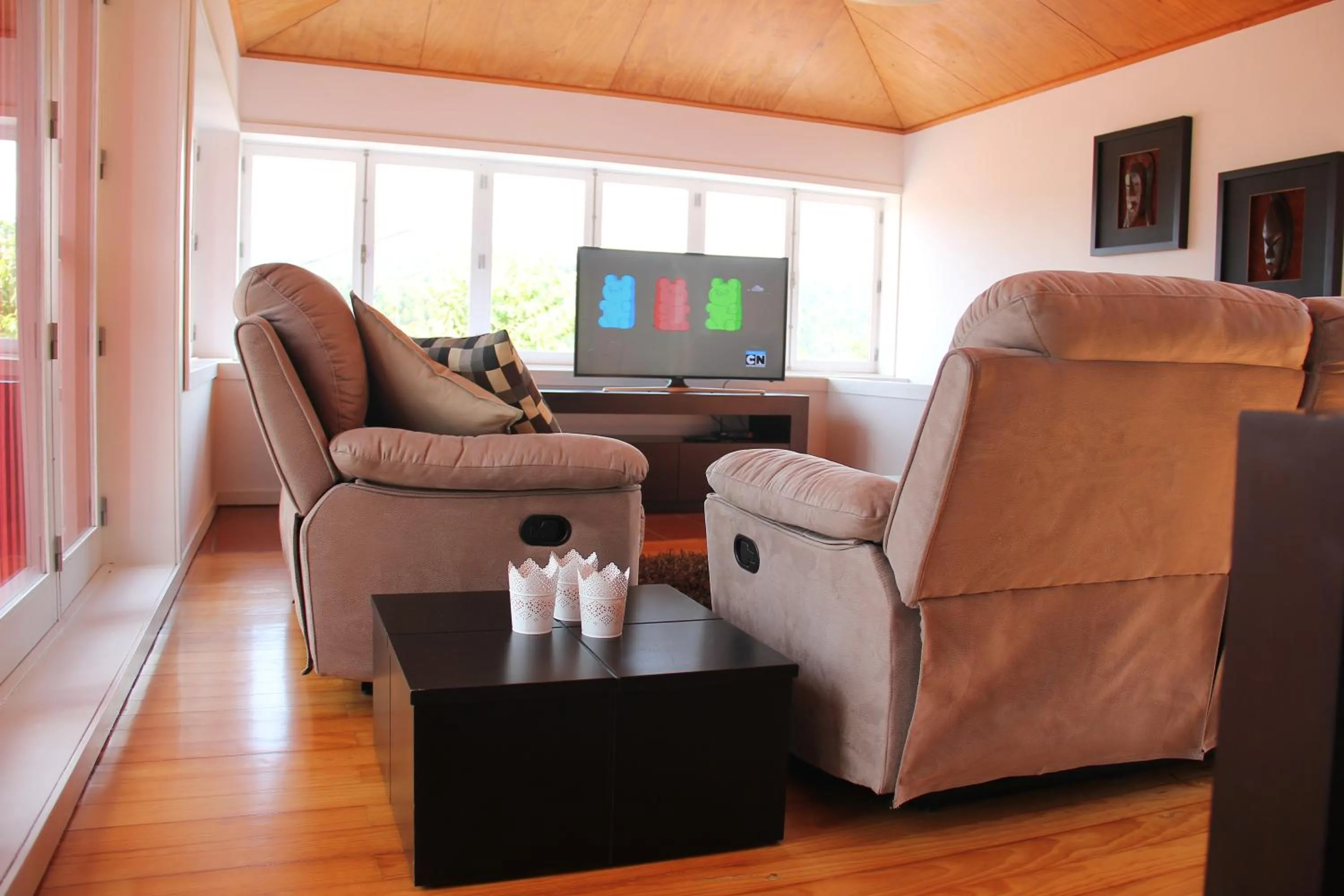 Communal lounge/ TV room in Casa da Bichaca