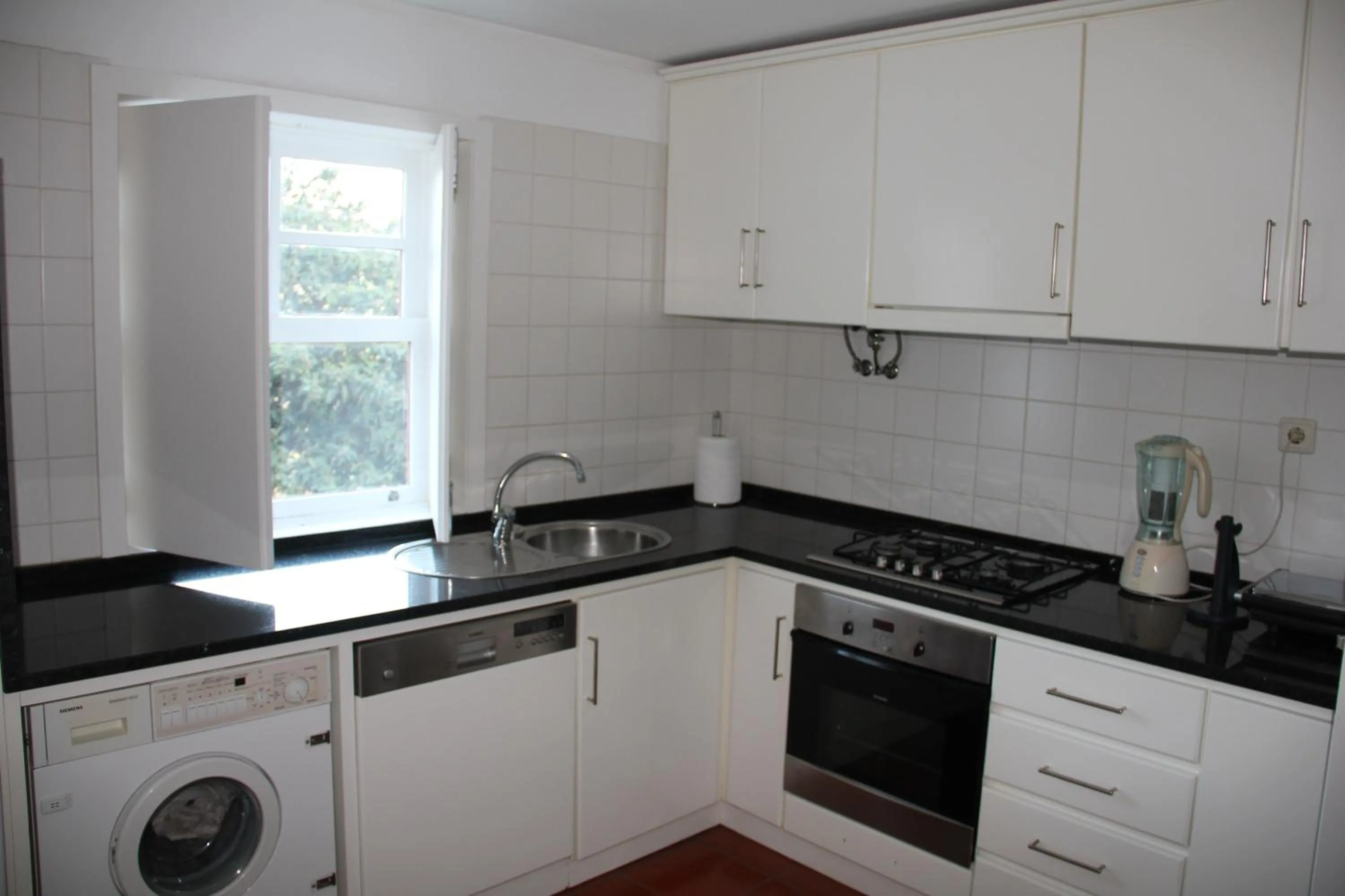 Kitchen or kitchenette in Casa da Bichaca