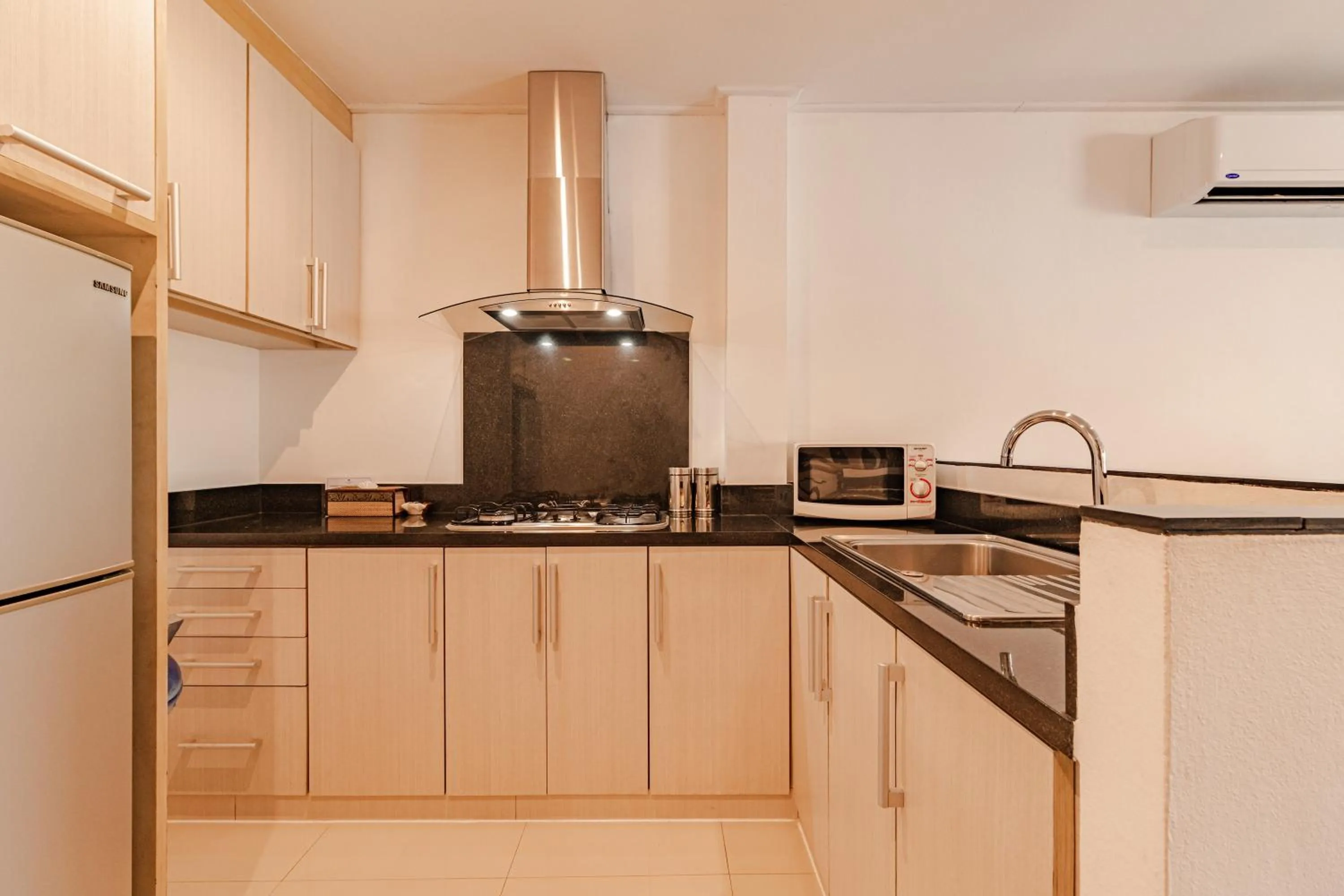 Kitchen or kitchenette in Kamala Beach Estate Resort - SHA Extra Plus