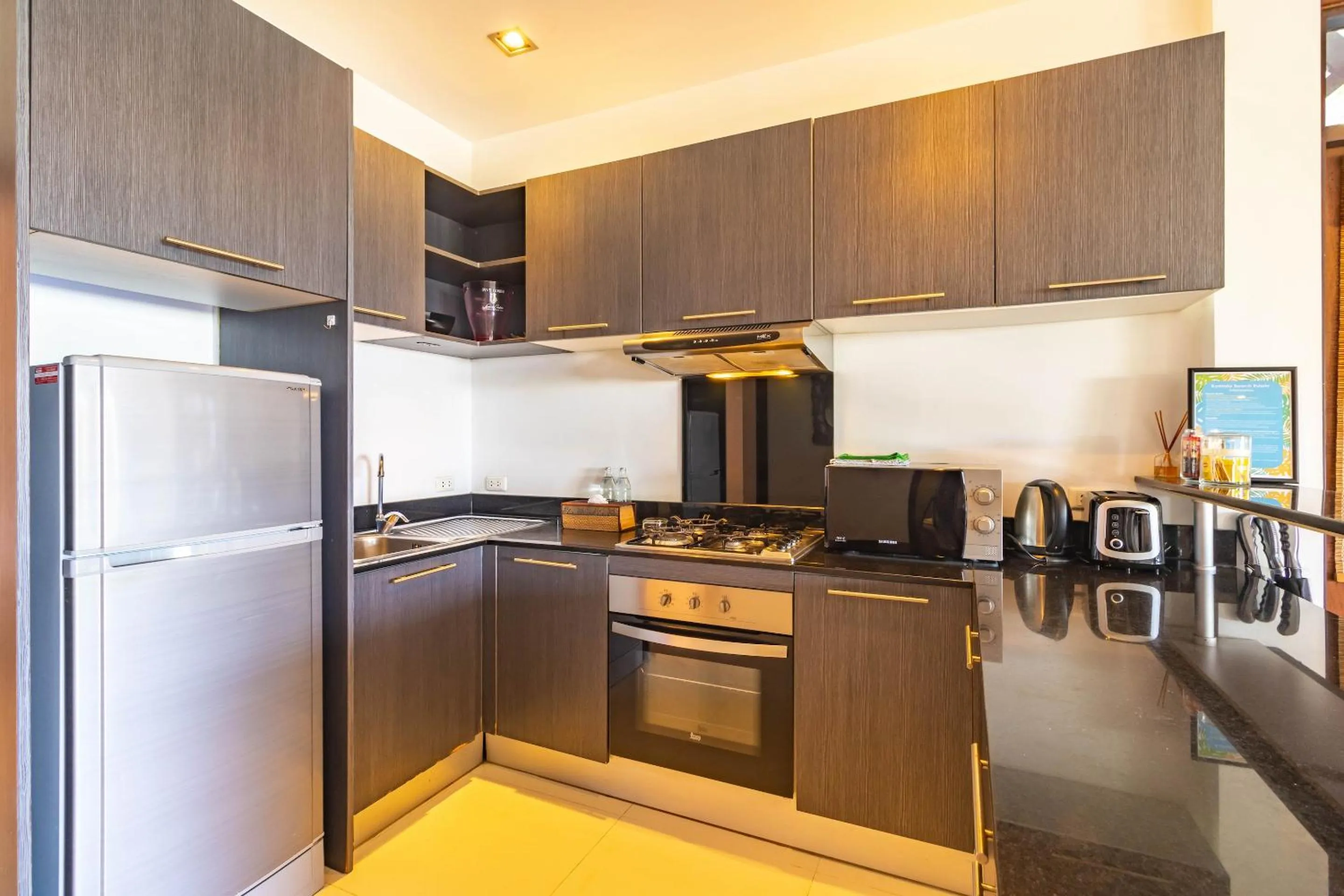kitchen in Kamala Beach Estate Resort - SHA Extra Plus