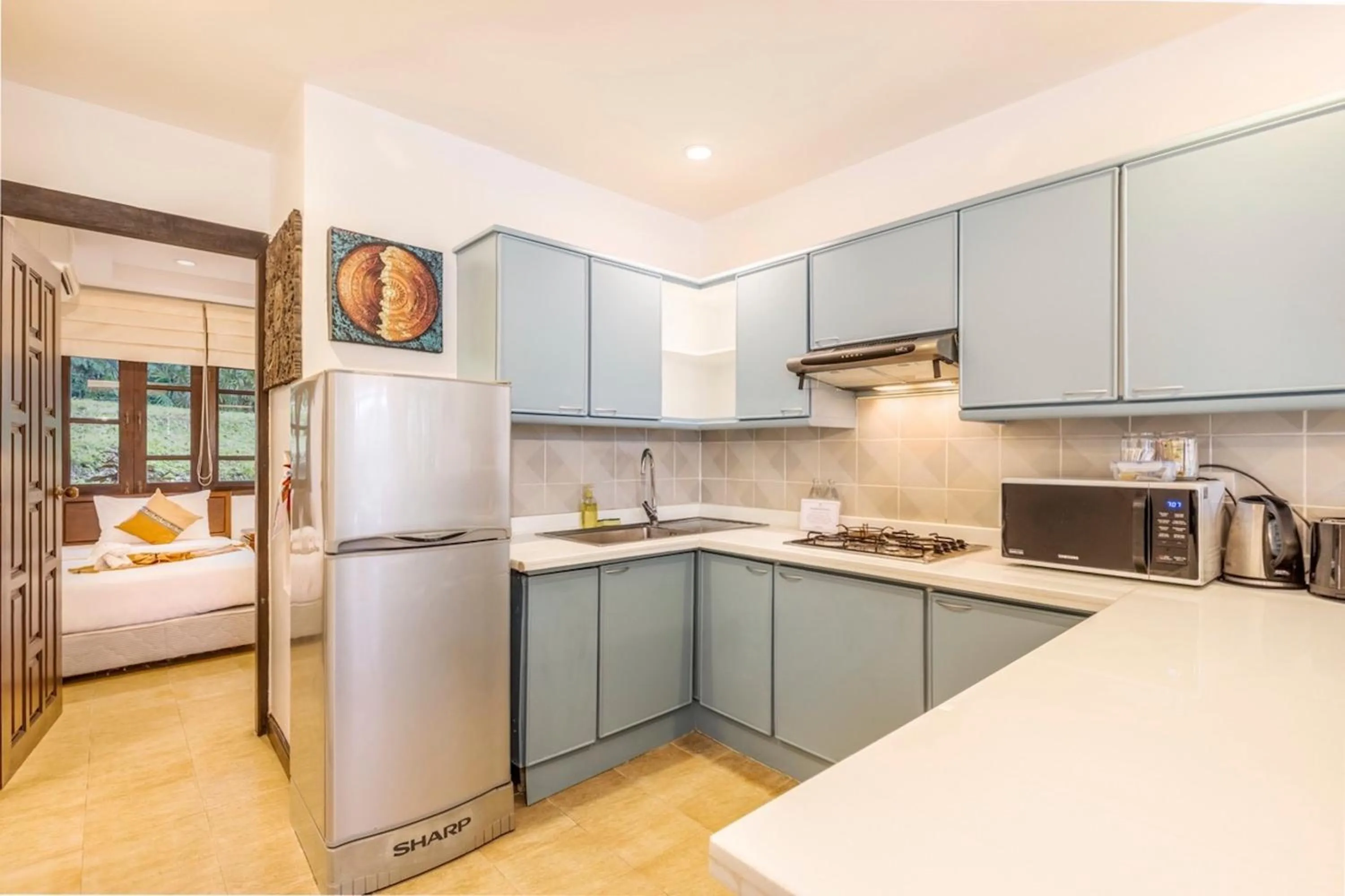 kitchen in Kamala Beach Estate Resort - SHA Extra Plus