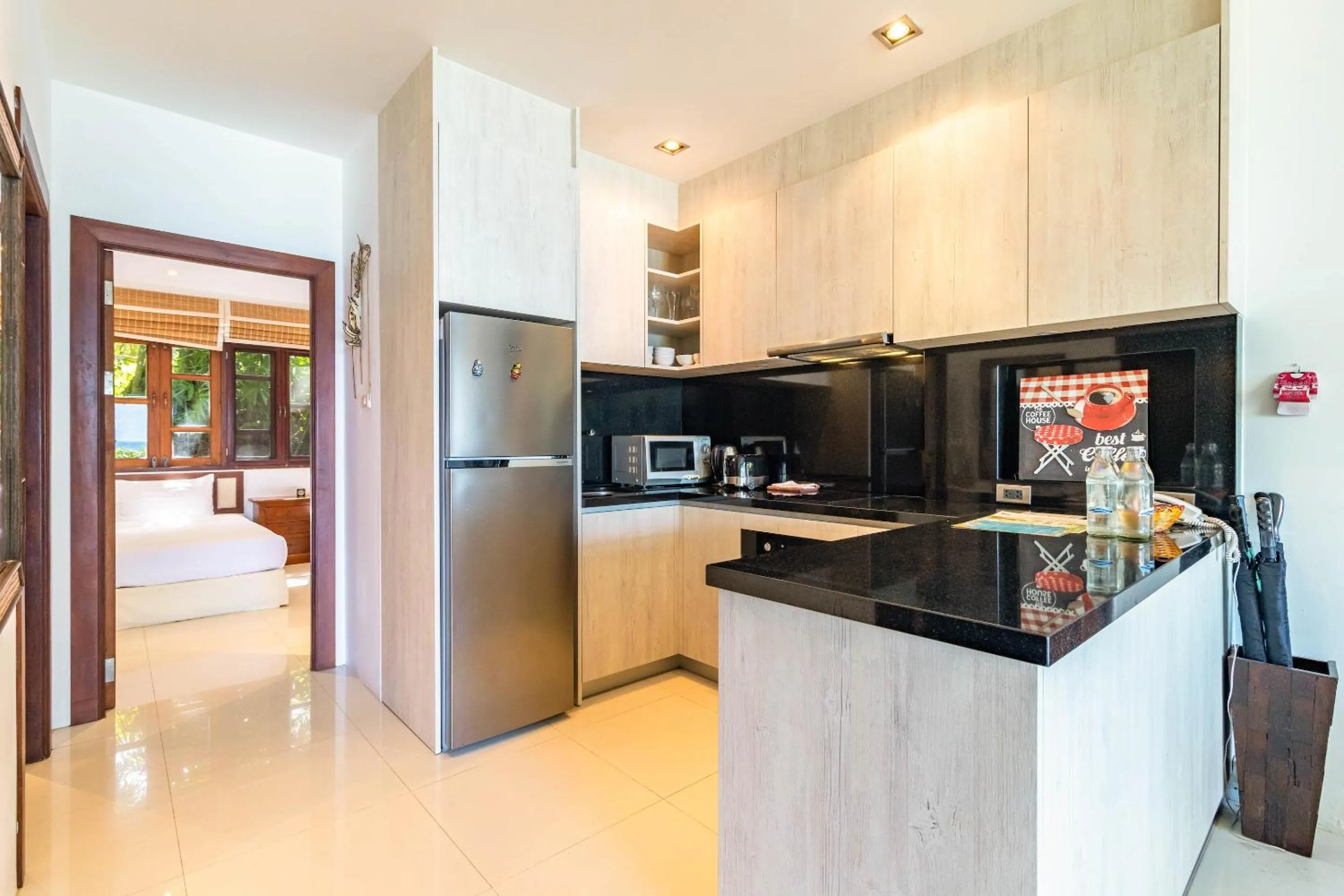 kitchen in Kamala Beach Estate Resort - SHA Extra Plus