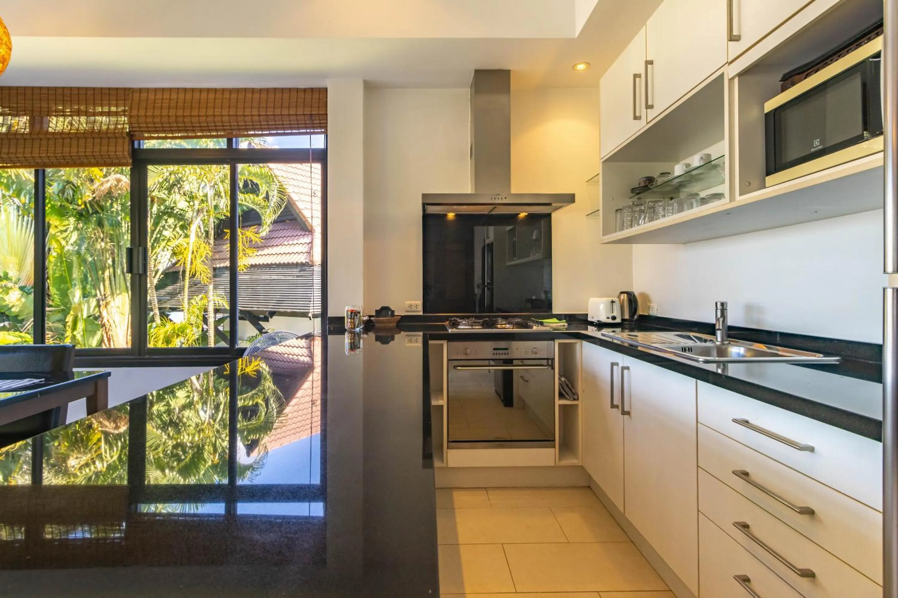 kitchen in Kamala Beach Estate Resort - SHA Extra Plus