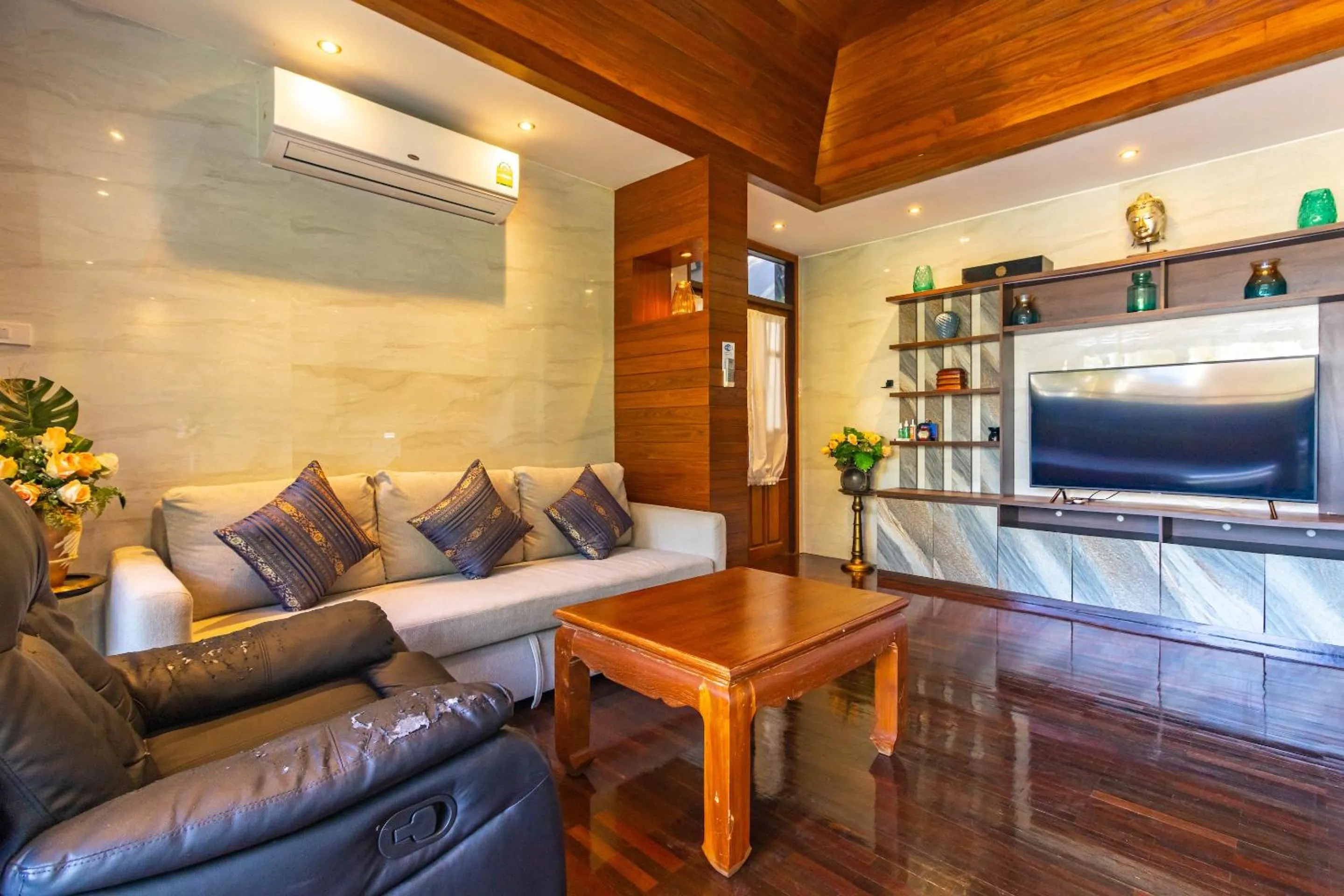 Living room in Kamala Beach Estate Resort - SHA Extra Plus