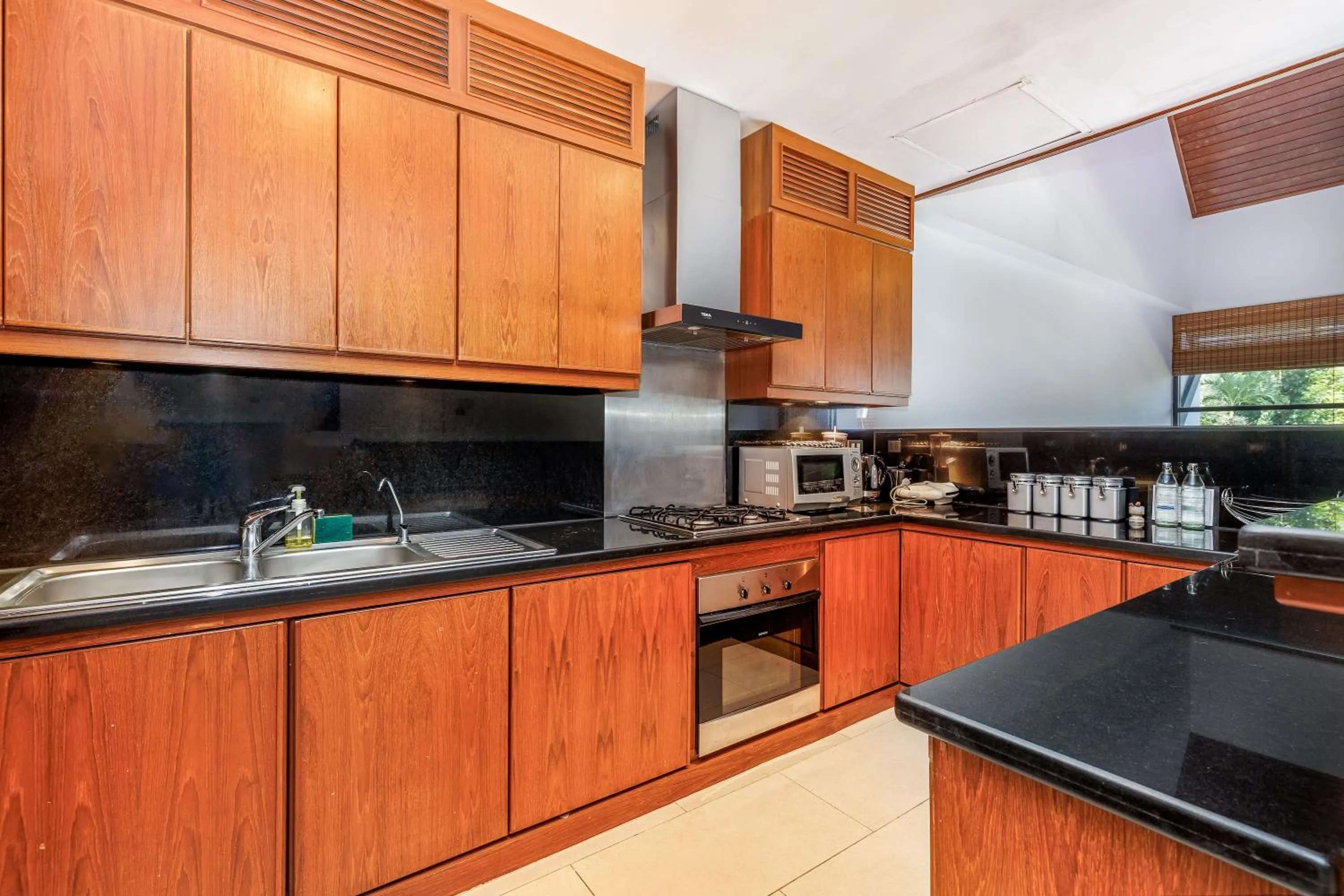 Kitchen or kitchenette in Kamala Beach Estate Resort - SHA Extra Plus
