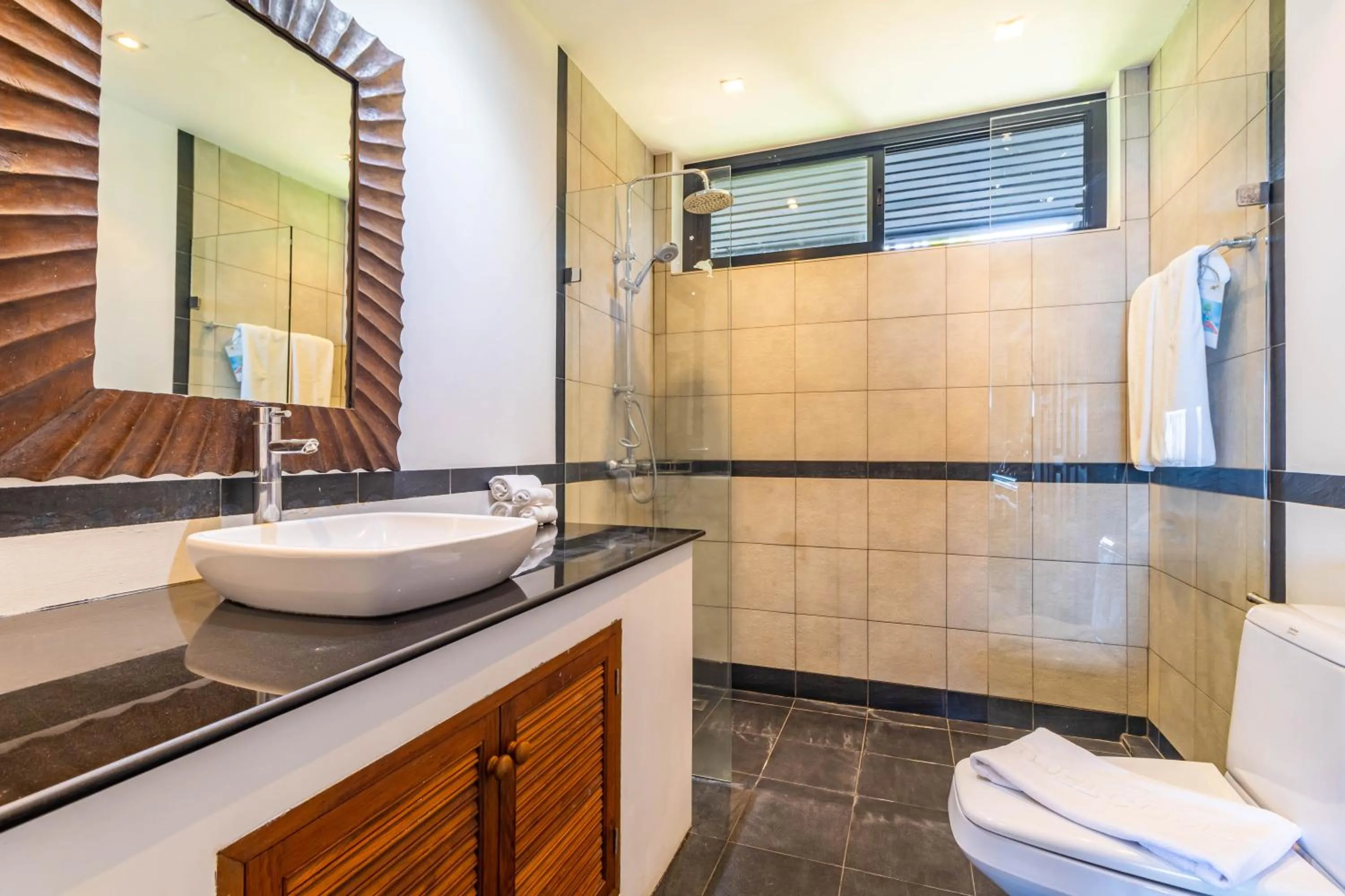 Bathroom in Kamala Beach Estate Resort - SHA Extra Plus