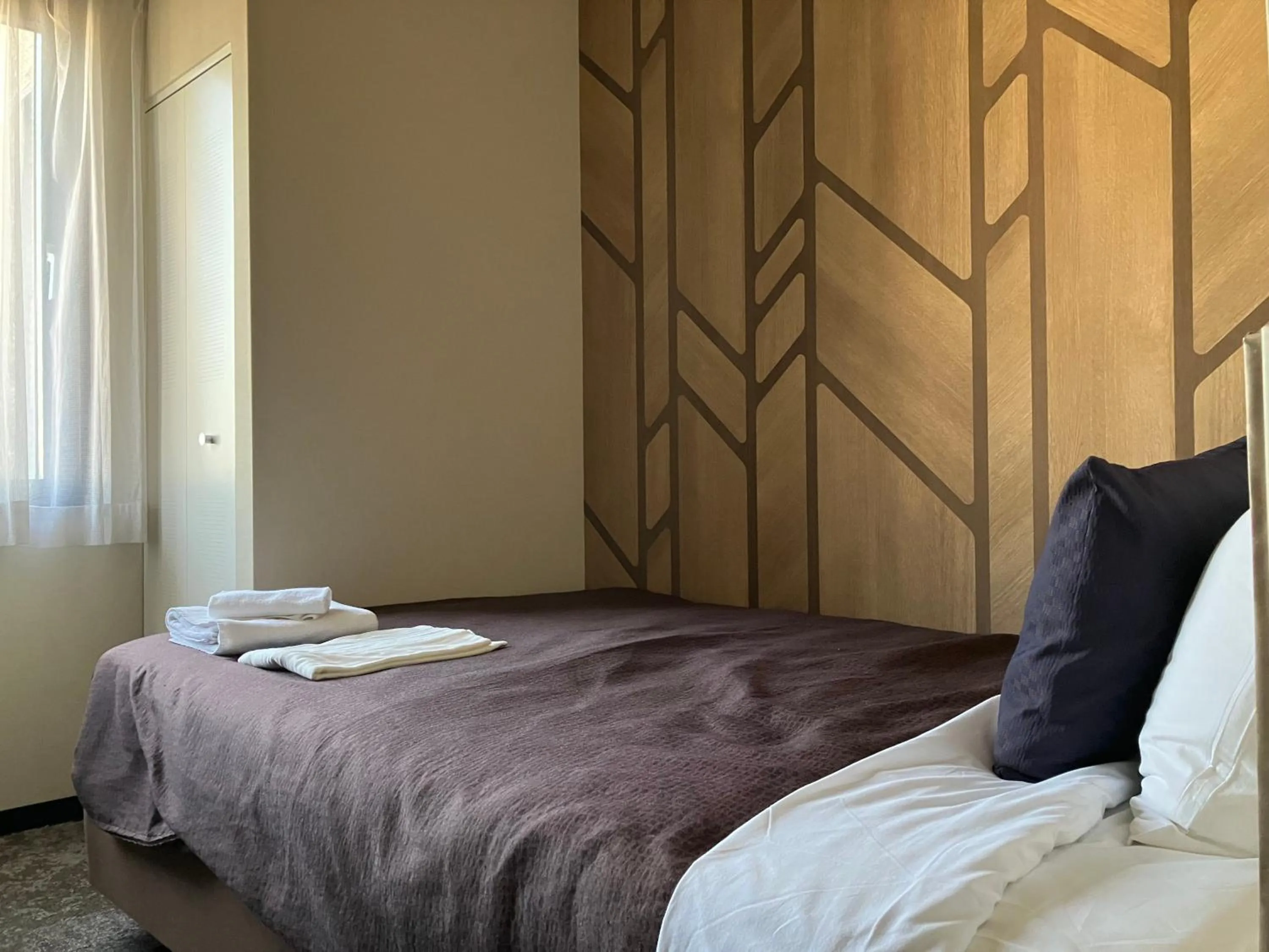 Bed in HOTEL LiVEMAX BUDGET Amagasaki