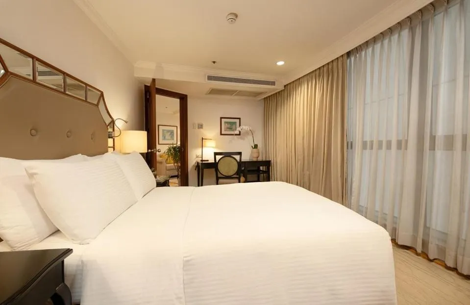 Bed in Discovery Suites Manila, Philippines