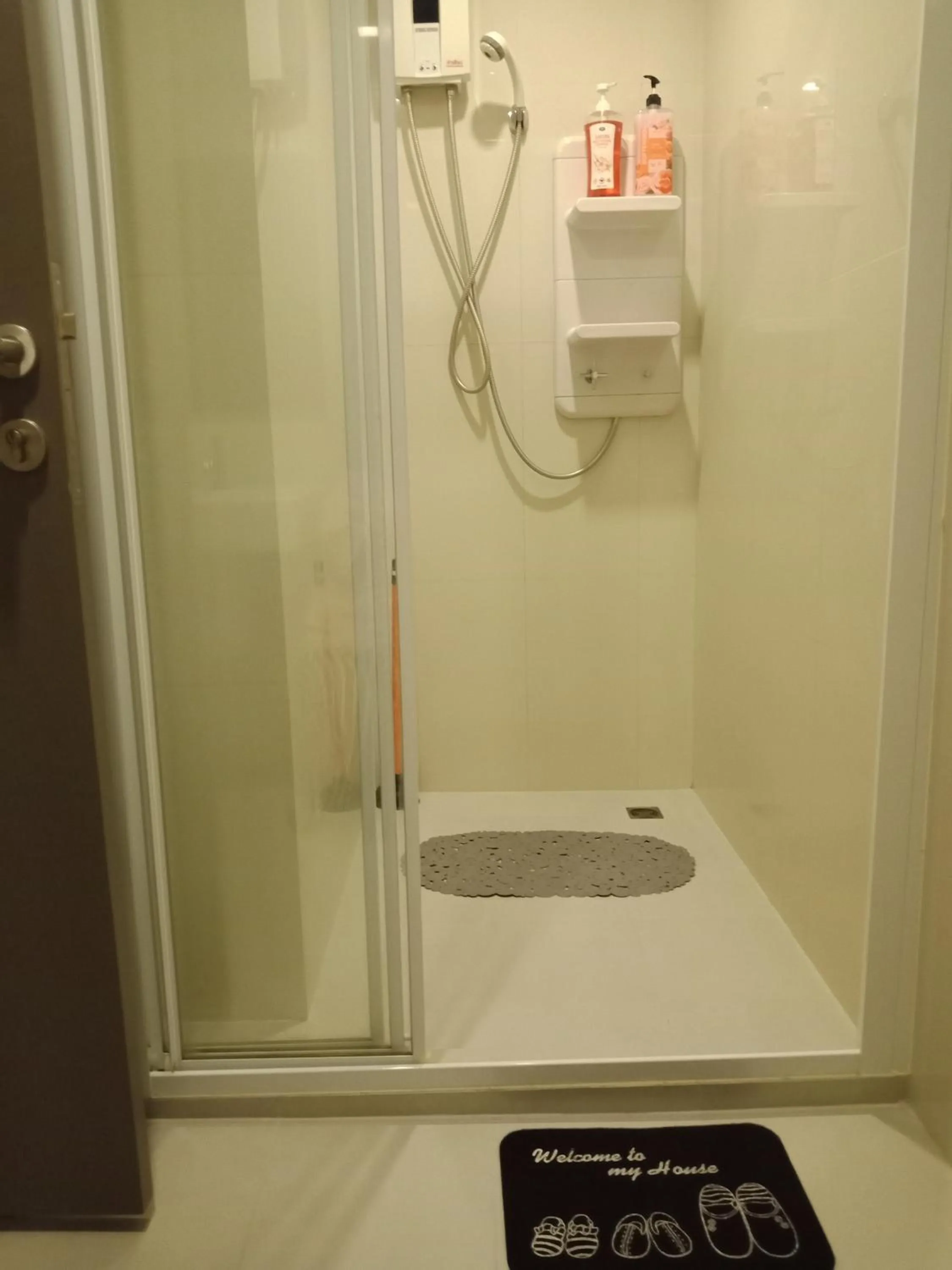 Shower in LLX Apartments at The Base condo