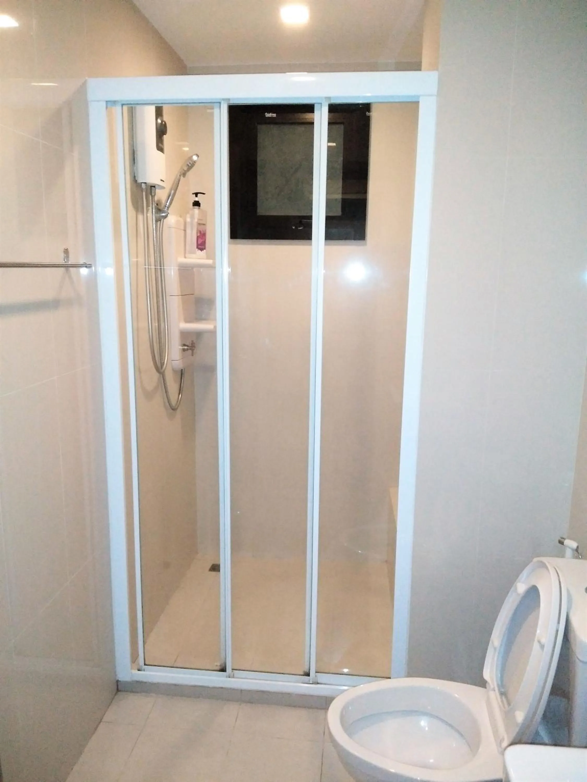 Shower in LLX Apartments at The Base condo