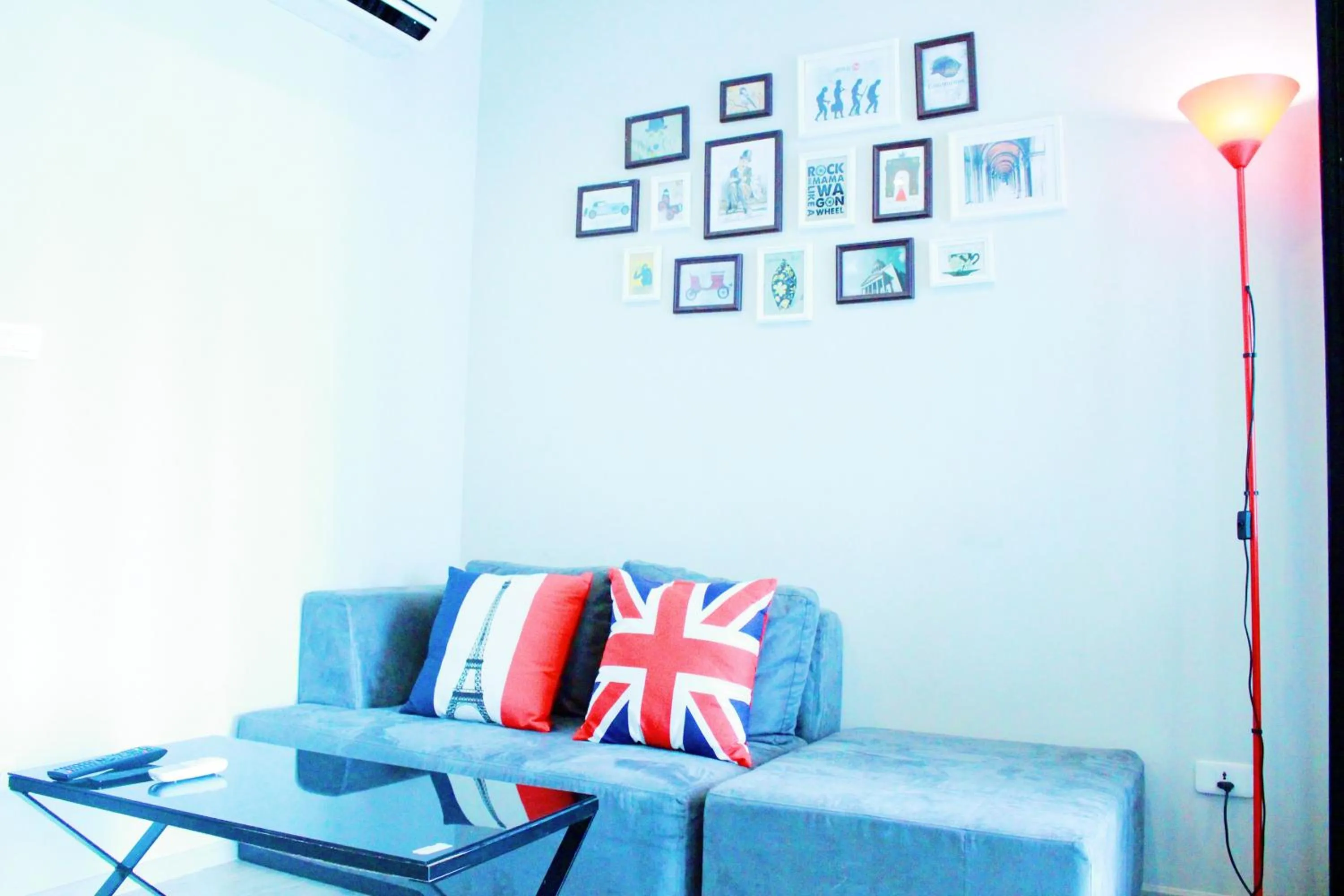 Living room in LLX Apartments at The Base condo