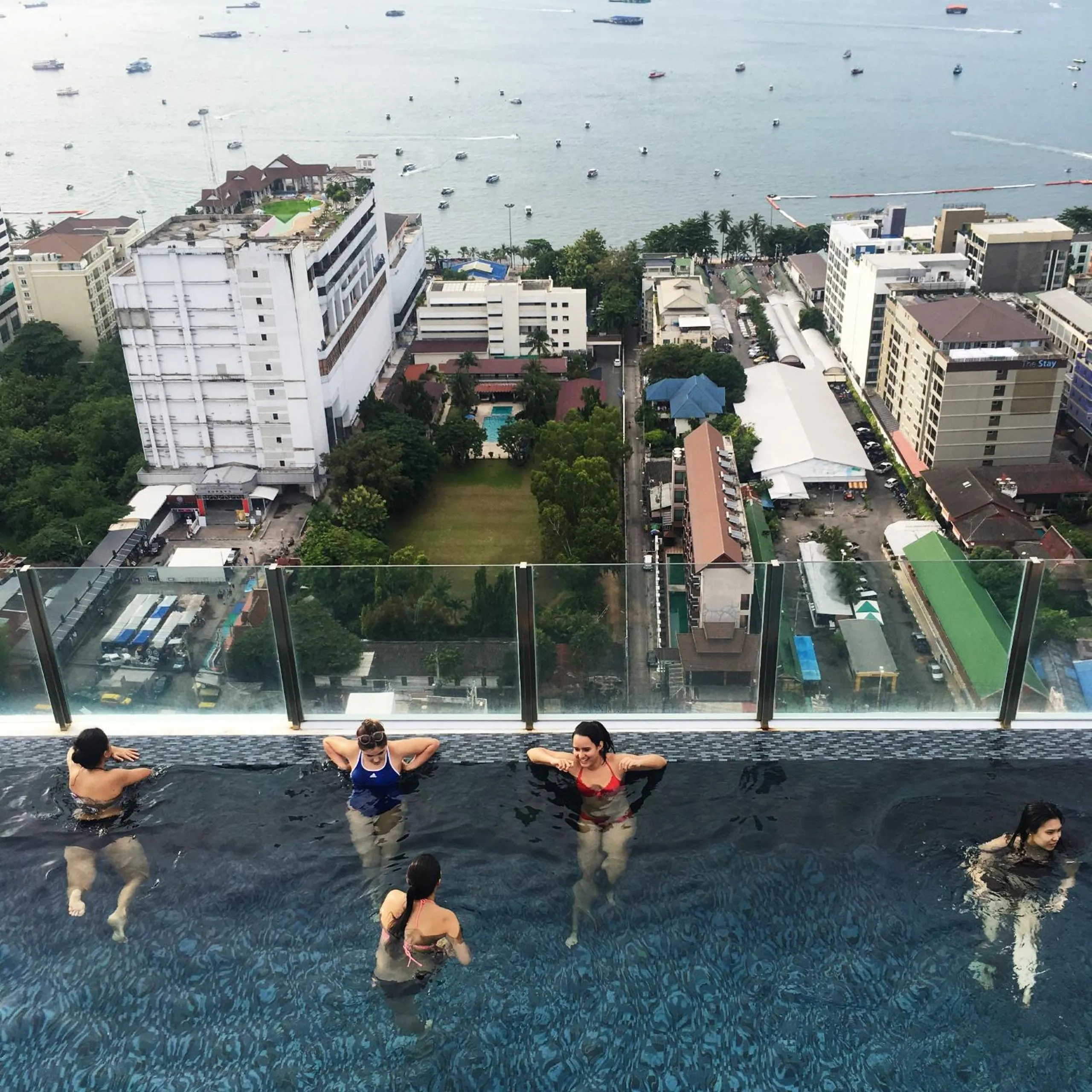 Pool view in LLX Apartments at The Base condo