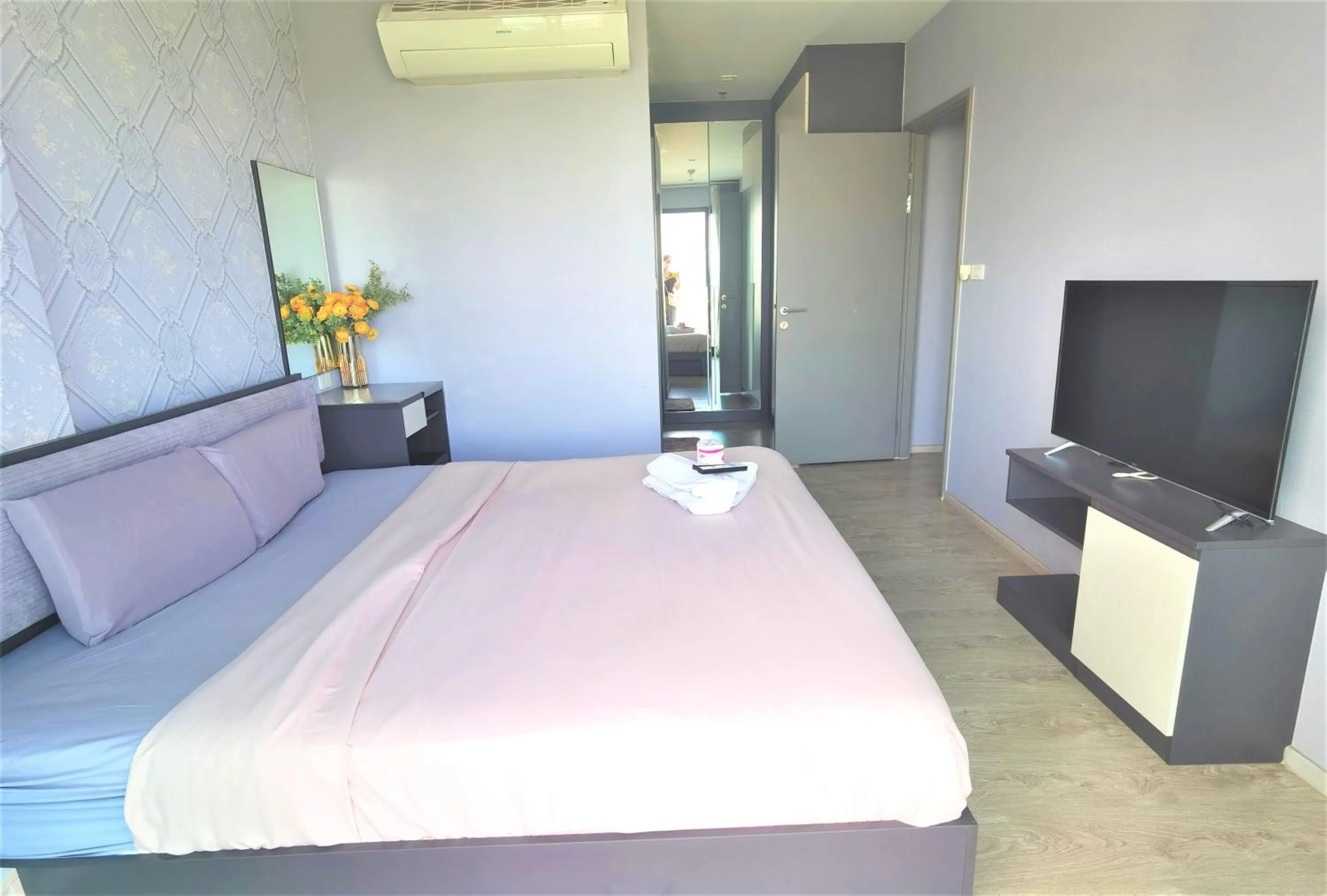 Bedroom, Bed in LLX Apartments at The Base condo