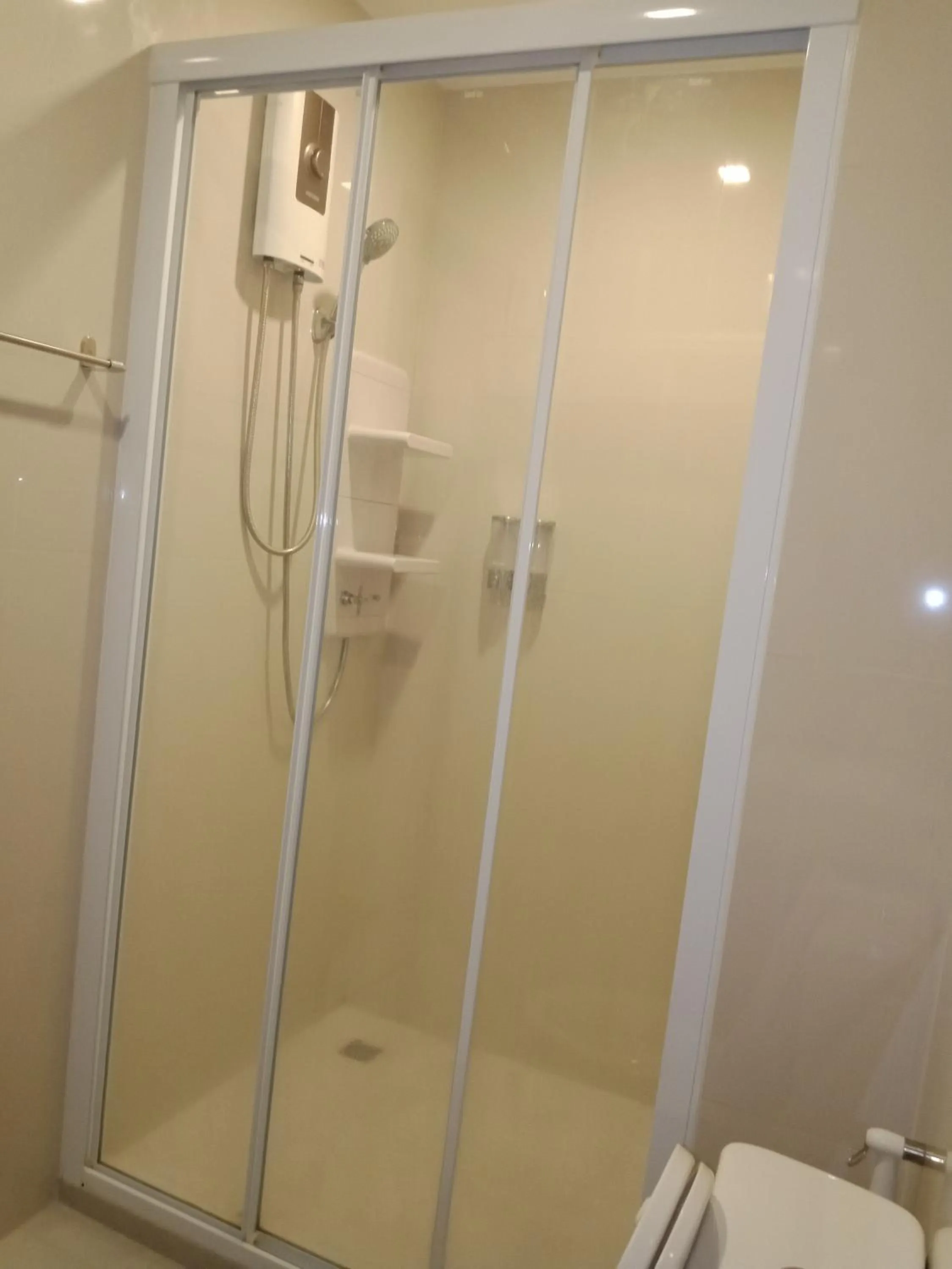 Shower in LLX Apartments at The Base condo