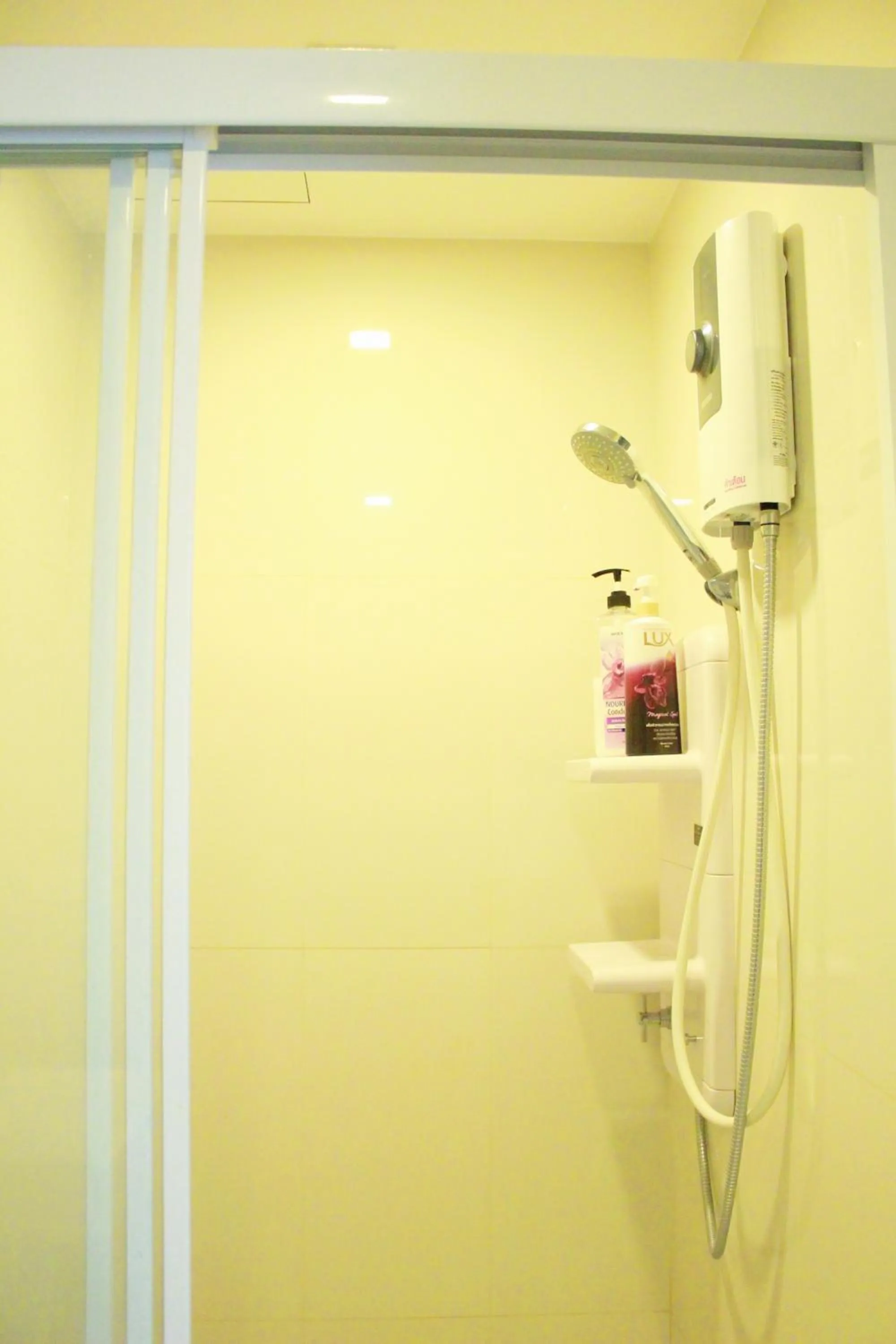 Bathroom in LLX Apartments at The Base condo