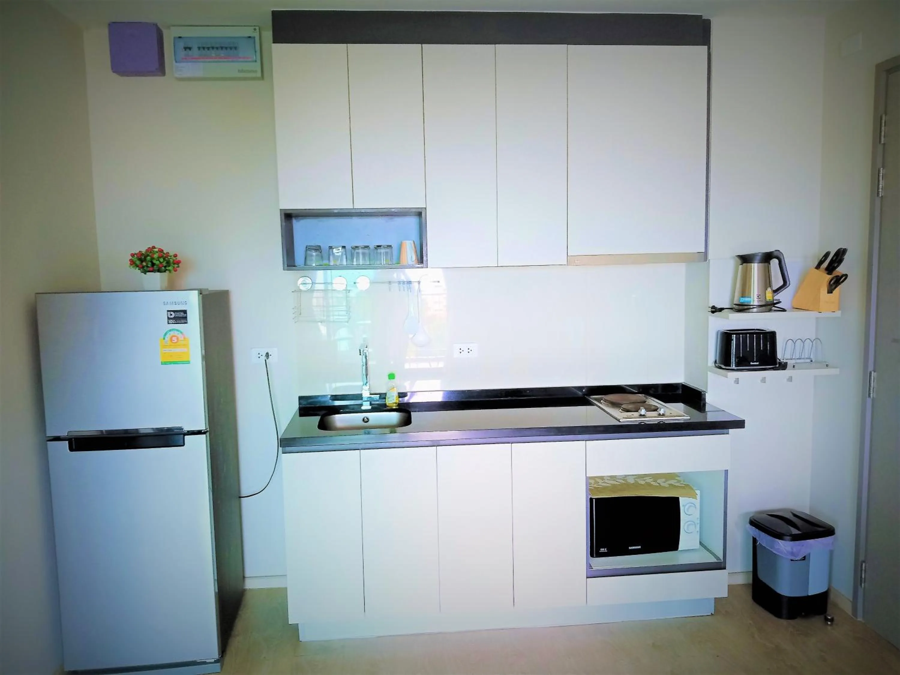 Kitchen or kitchenette in LLX Apartments at The Base condo