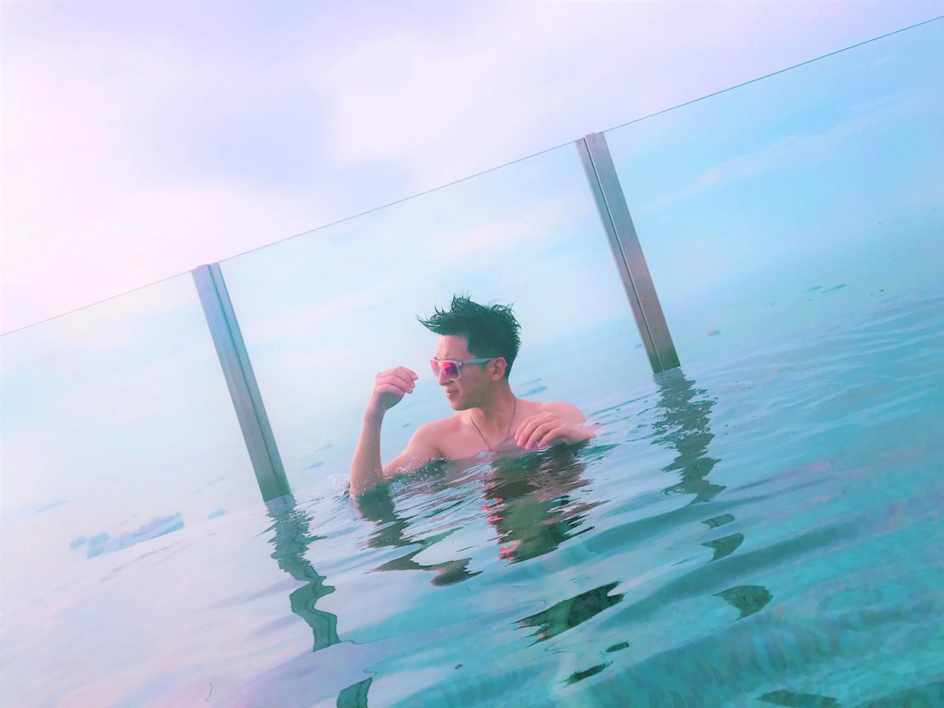 Pool view in LLX Apartments at The Base condo