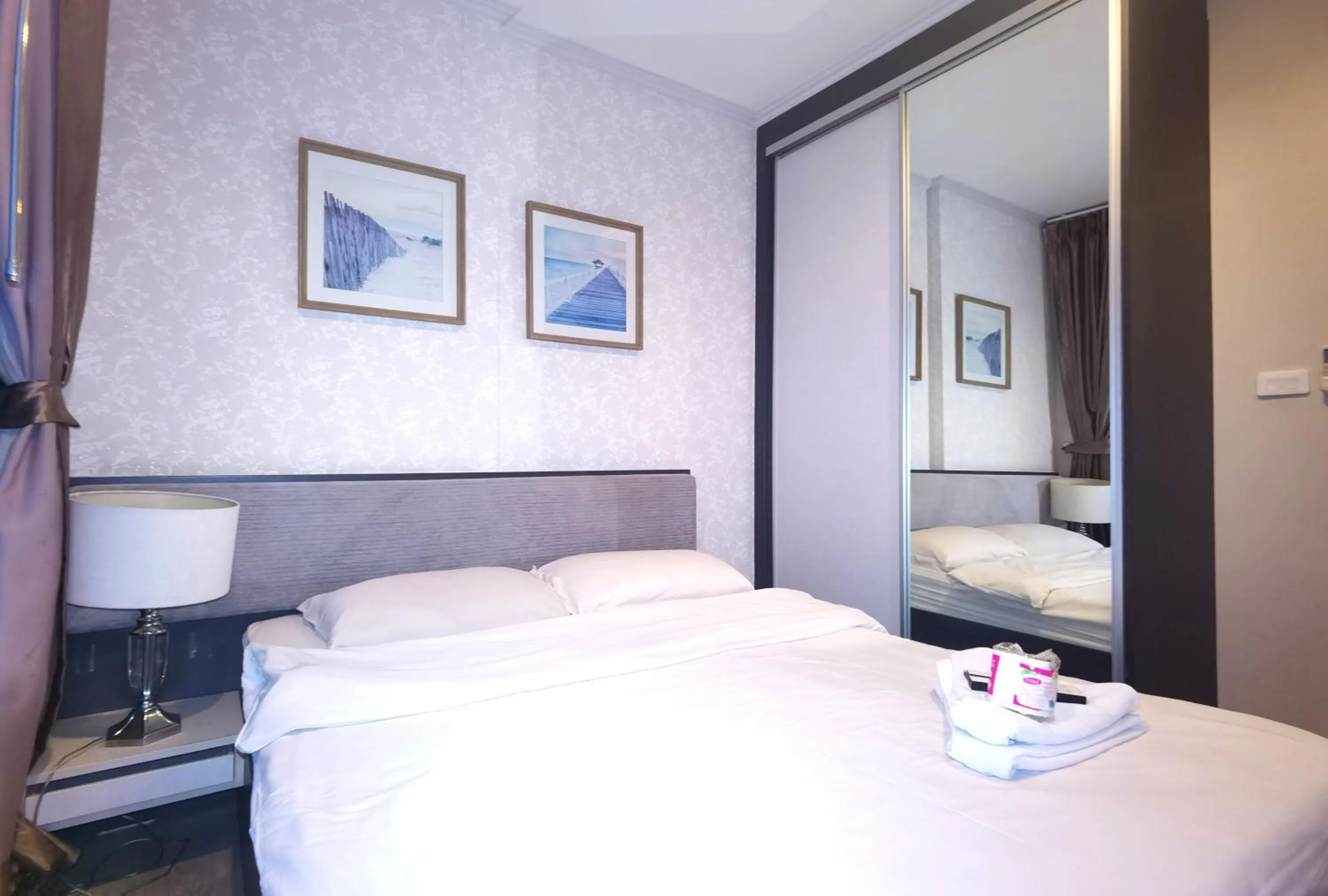 Bed in LLX Apartments at The Base condo