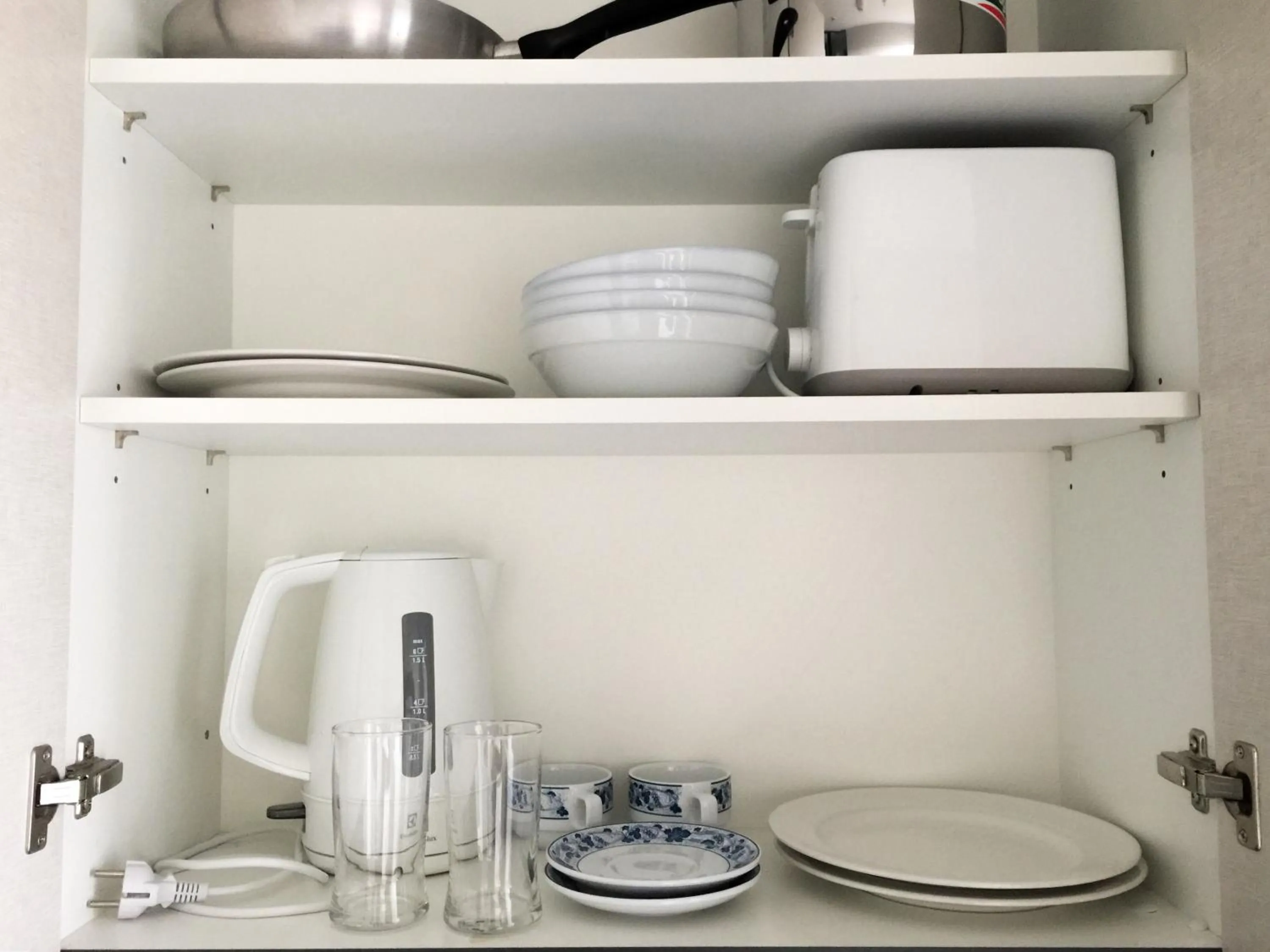 Dining area in LLX Apartments at The Base condo