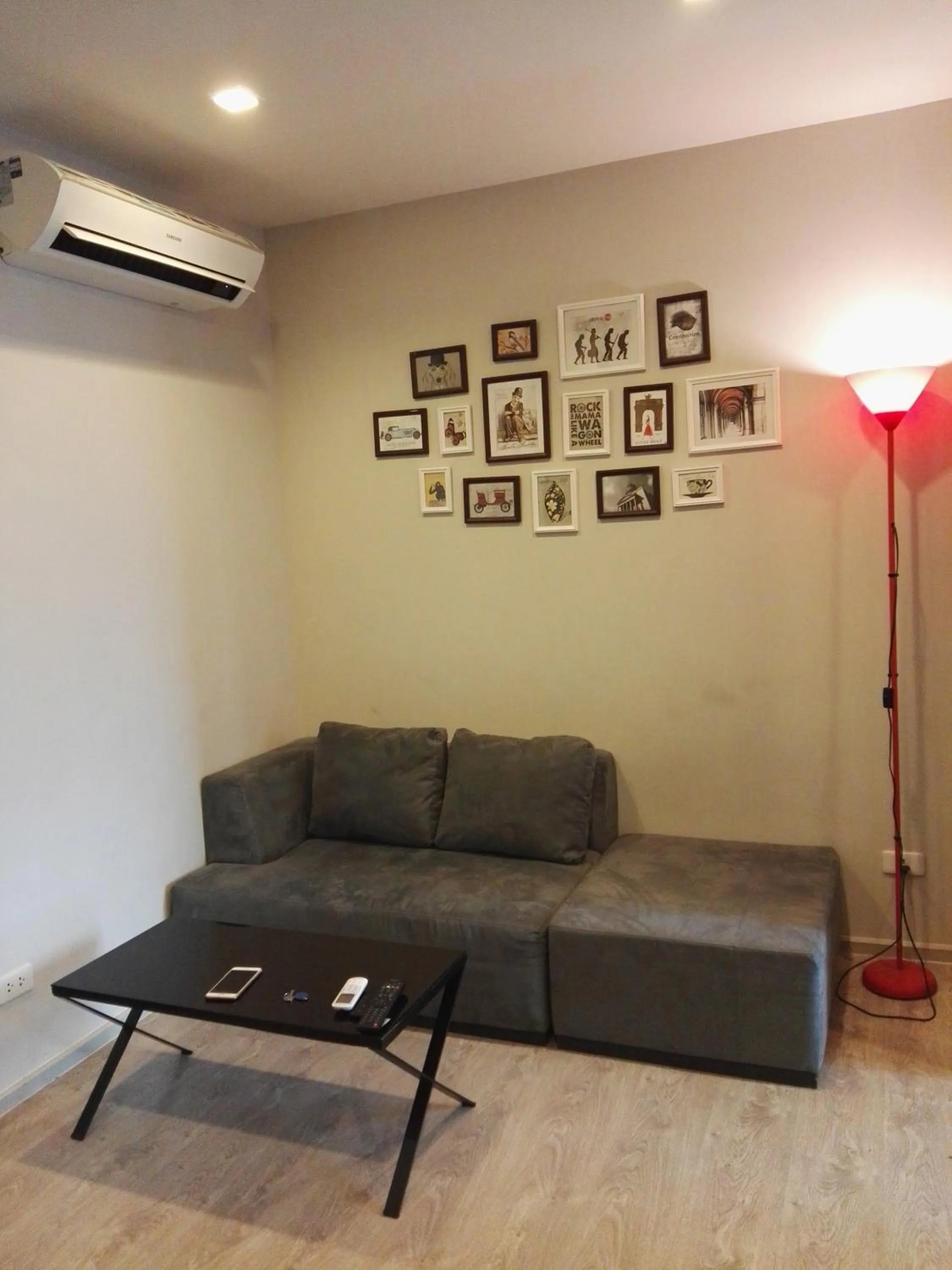 Living room in LLX Apartments at The Base condo