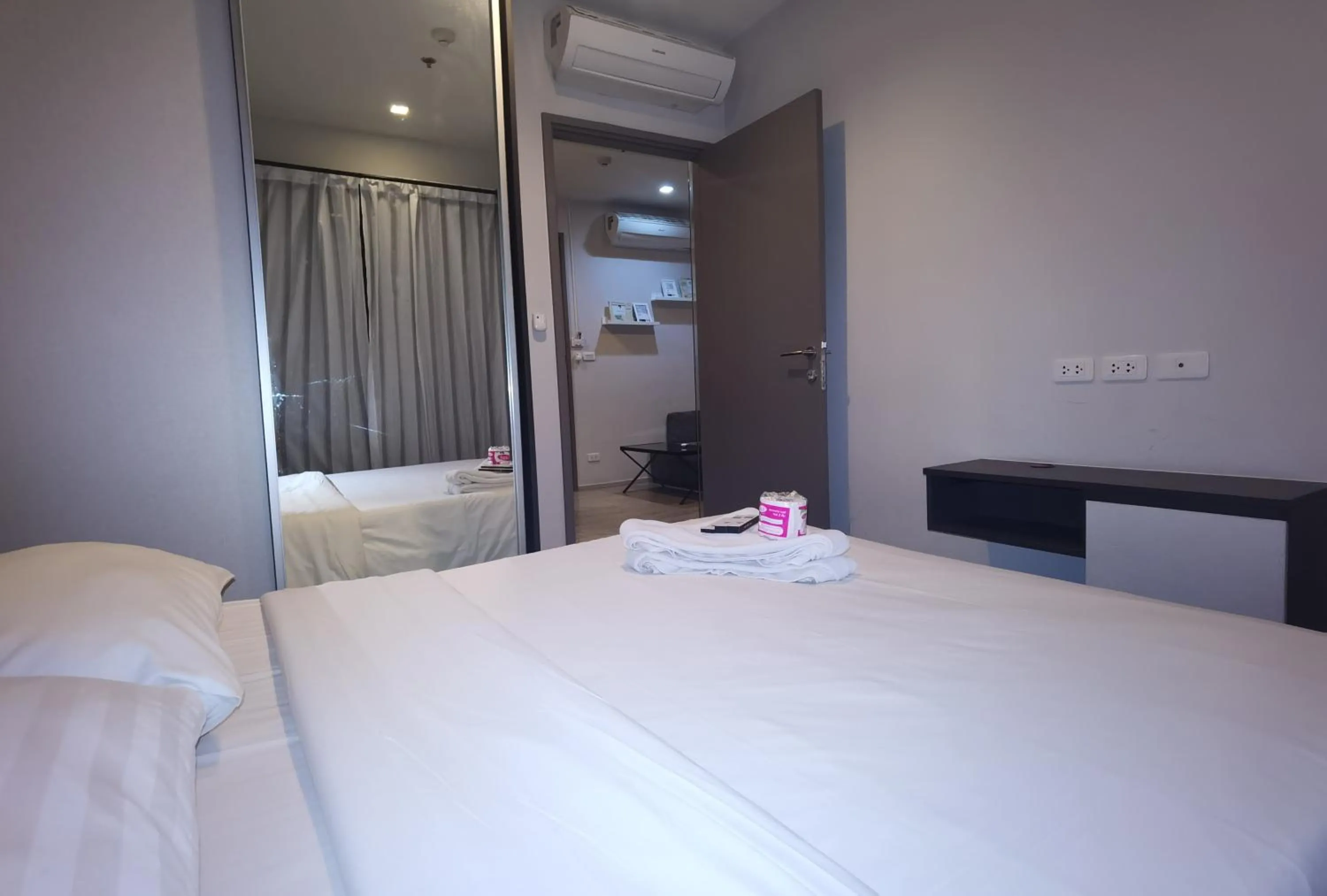 Bed in LLX Apartments at The Base condo