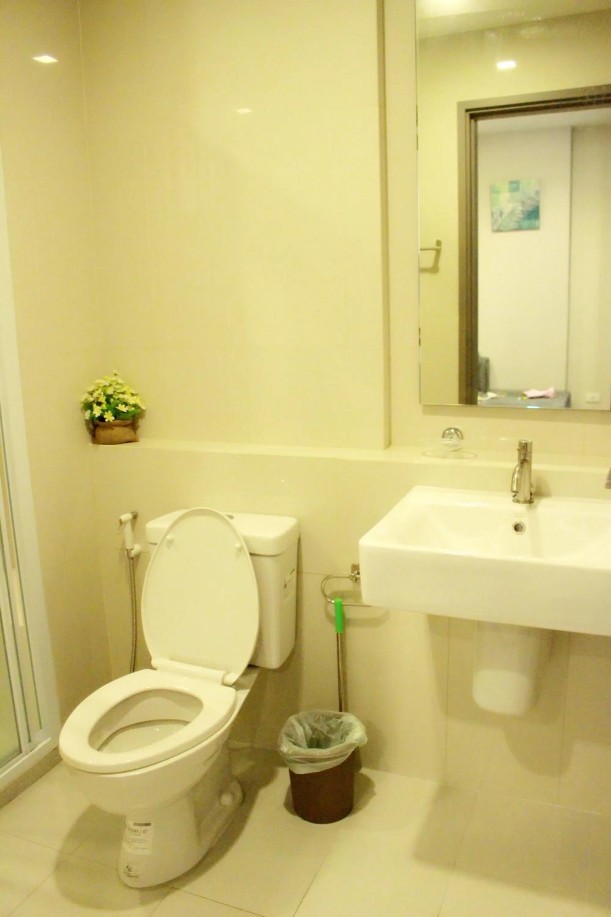 Bathroom in LLX Apartments at The Base condo