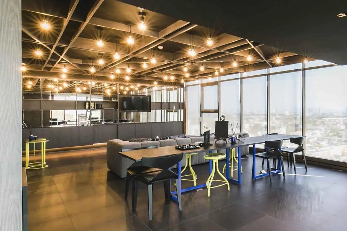 Communal lounge/ TV room in LLX Apartments at The Base condo