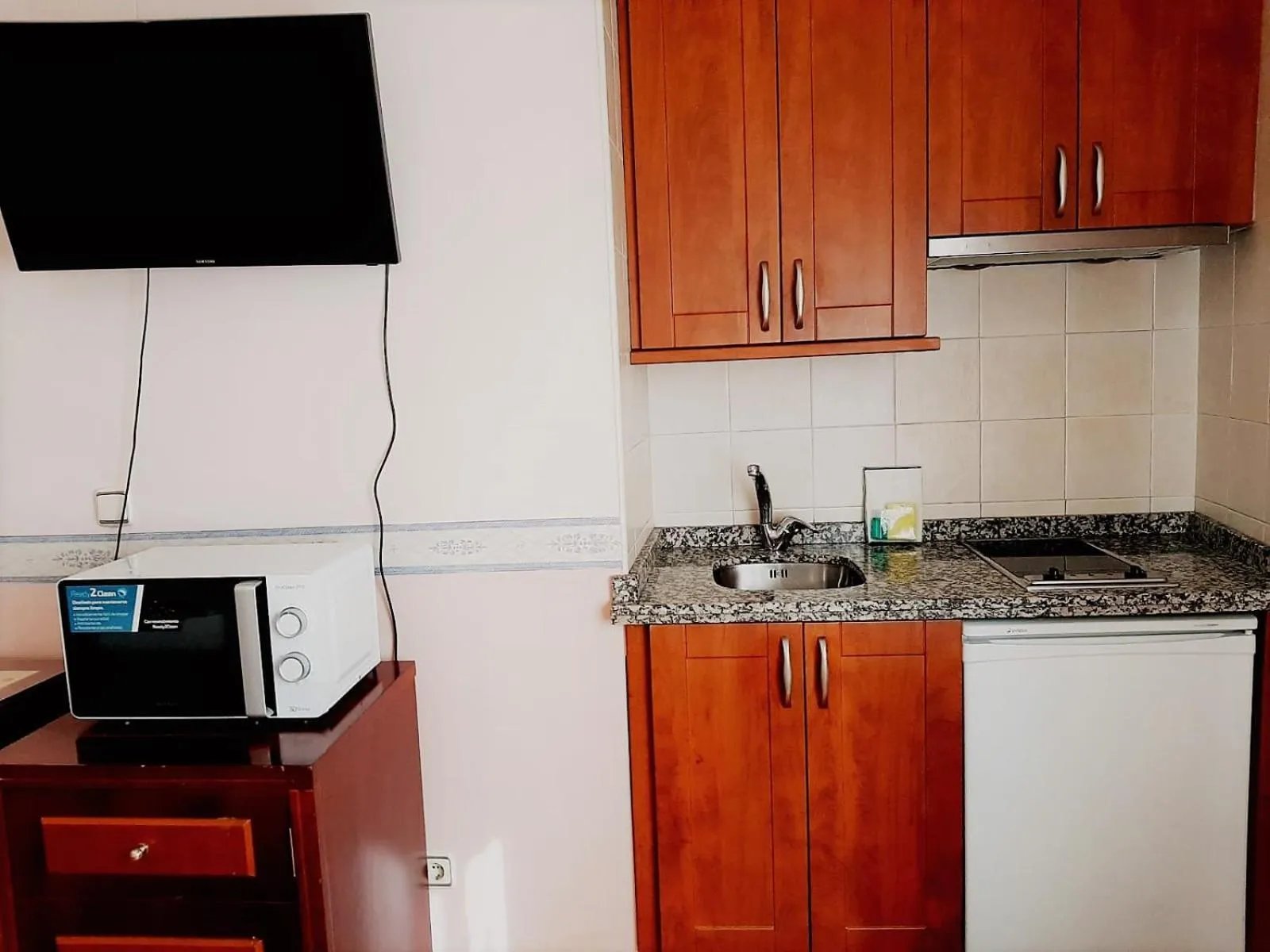 Kitchen or kitchenette in Hosteria Sara by gaiarooms