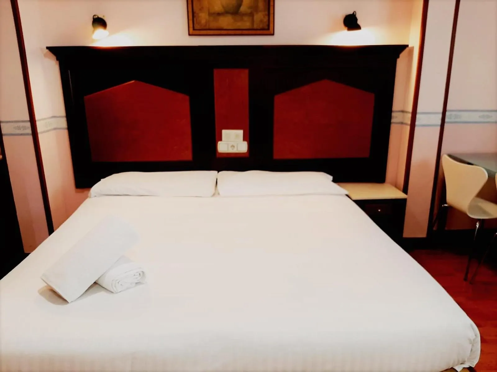 Bed in Hosteria Sara by gaiarooms