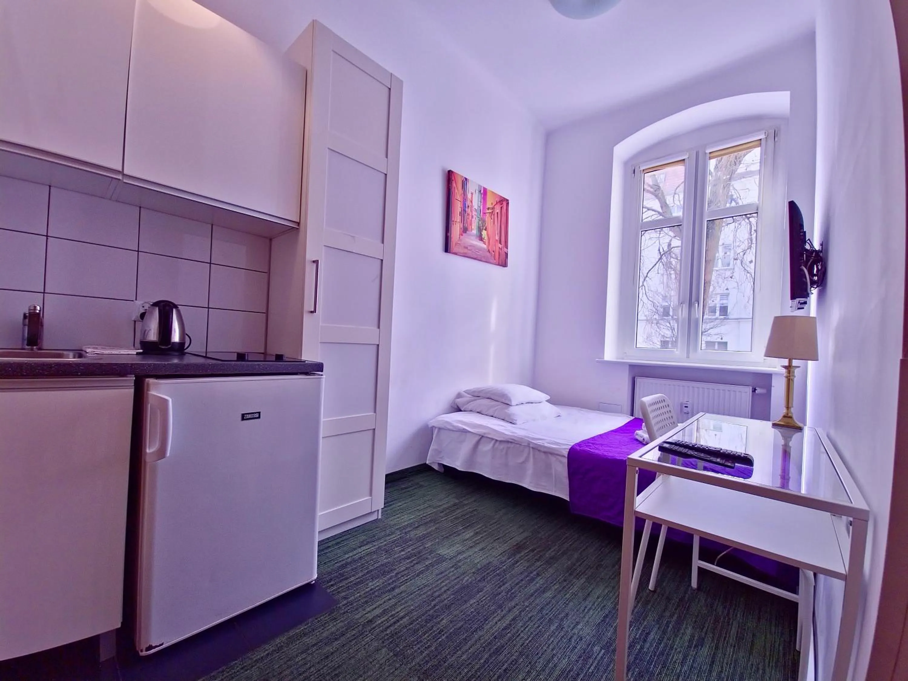 Kitchen or kitchenette, Bed in Apartamenty Velvet