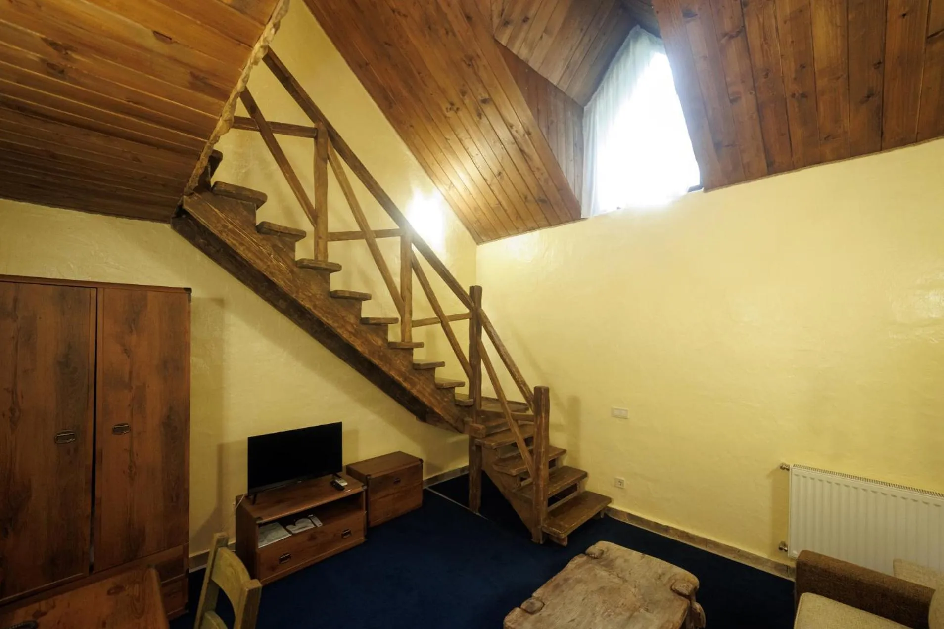 Communal lounge/ TV room in Drevny Grad Park-hotel