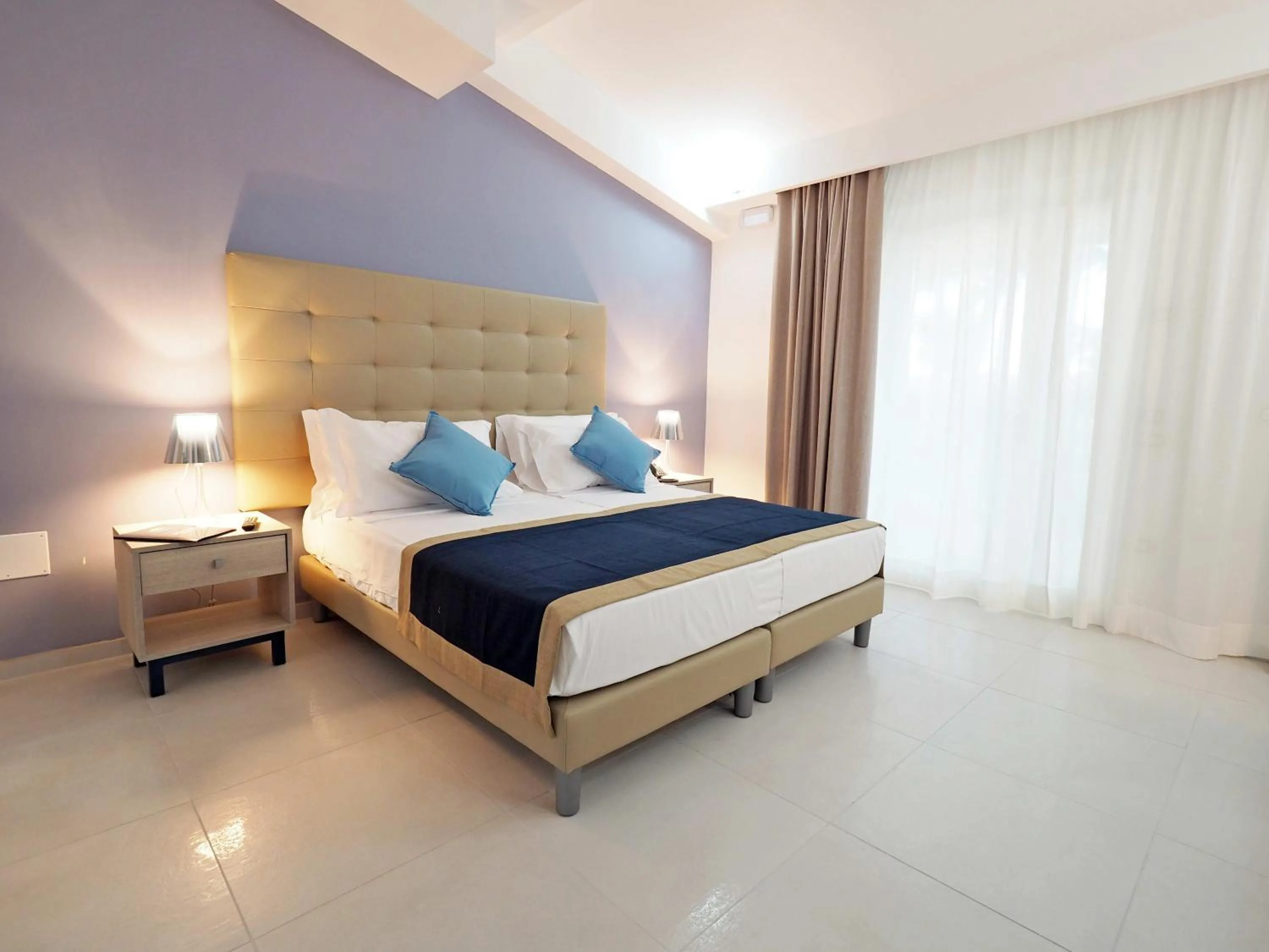 Photo of the whole room, Bed in TUI BLUE Tropea
