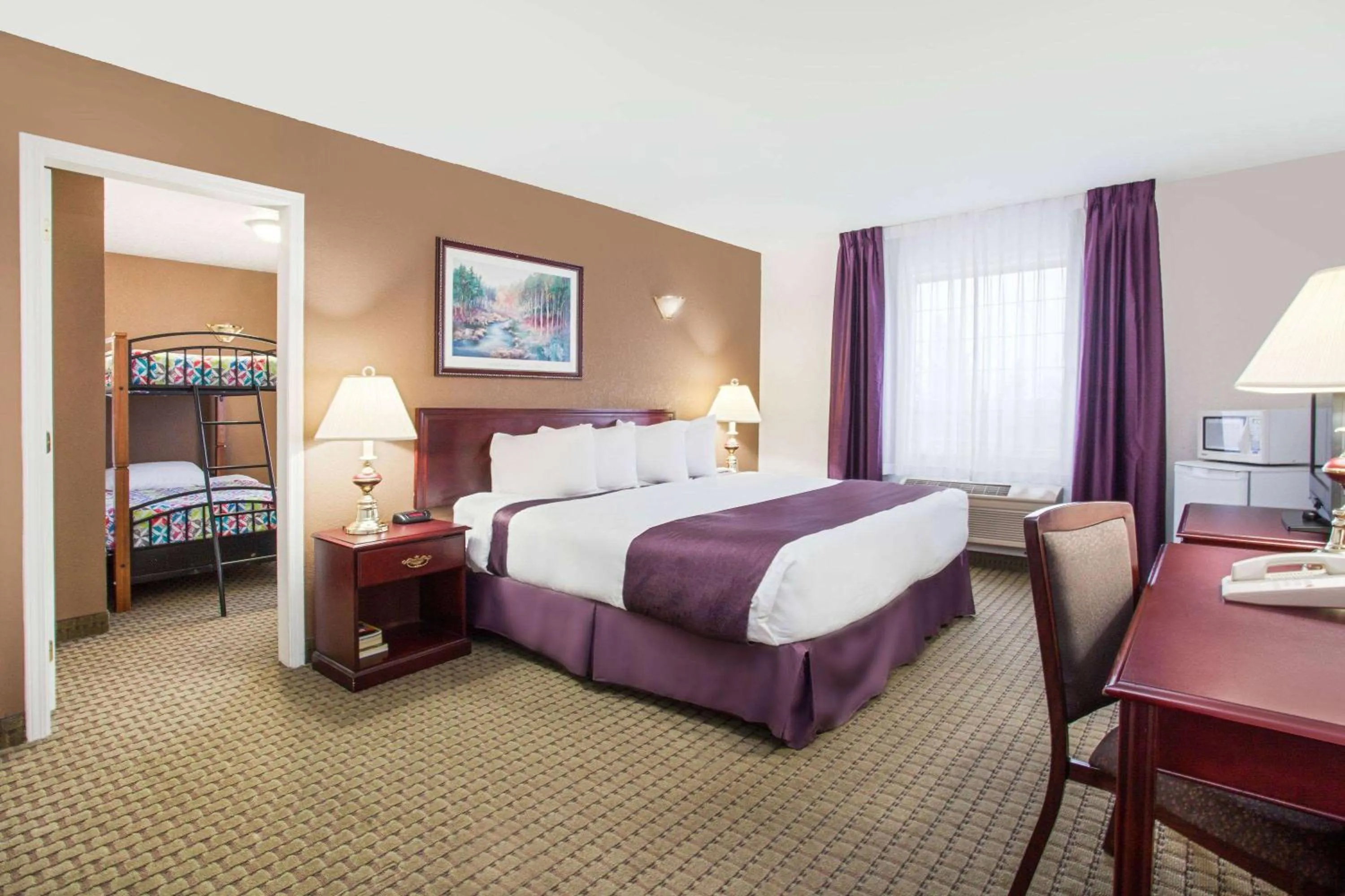 Photo of the whole room, Bed in Ramada by Wyndham Red Deer Hotel & Suites