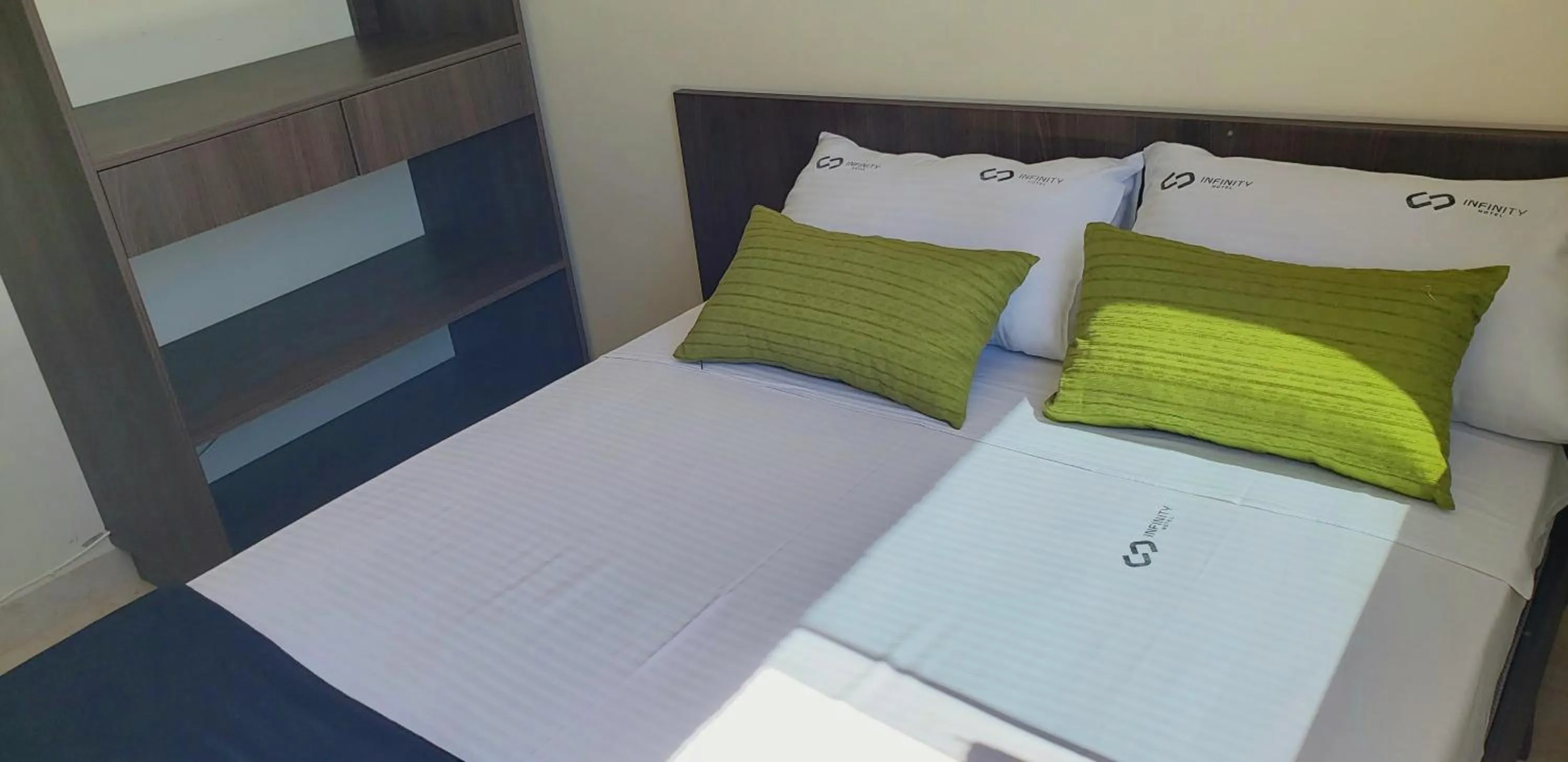 Bed in Infinity Hotel