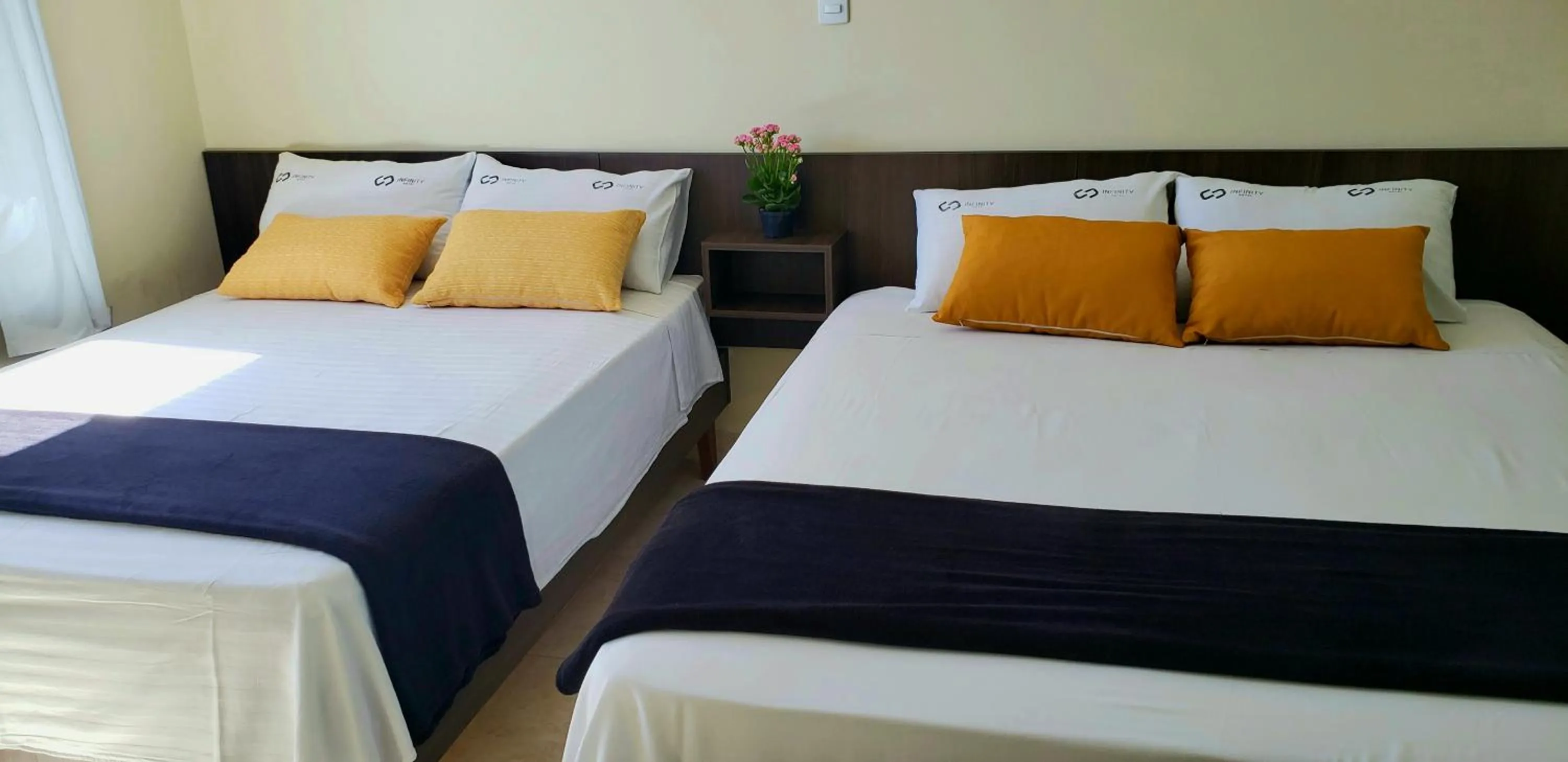 Bed in Infinity Hotel