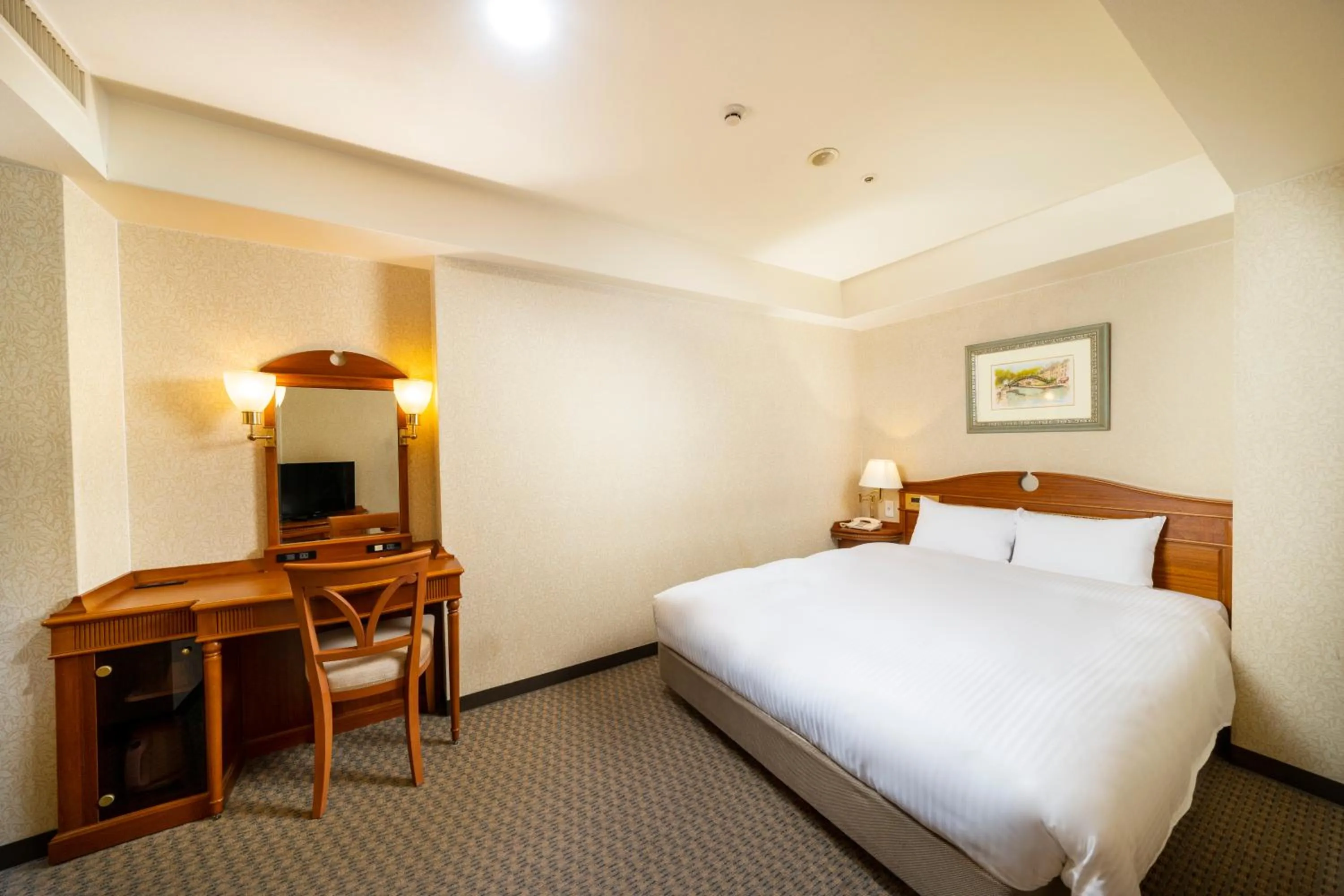 Bed in KOKO HOTEL Nagoya Sakae