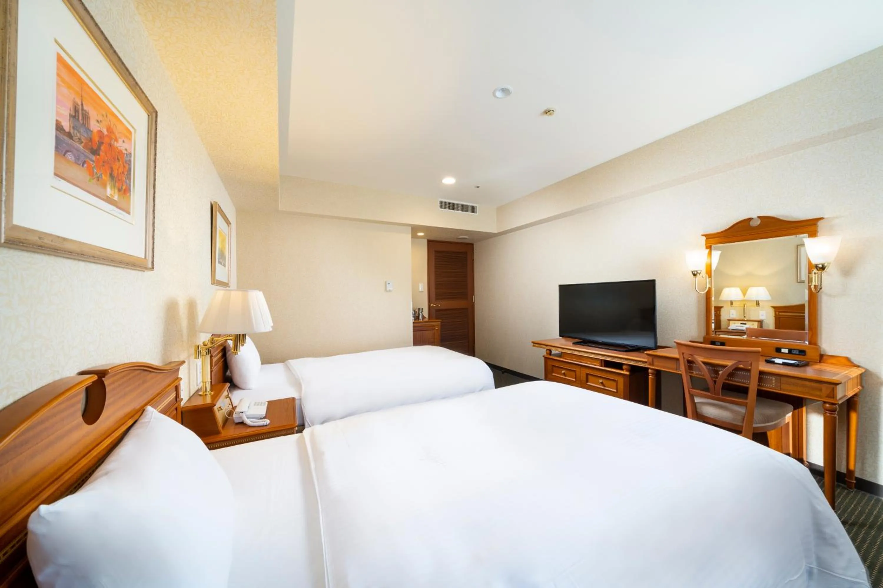 Bed in KOKO HOTEL Nagoya Sakae