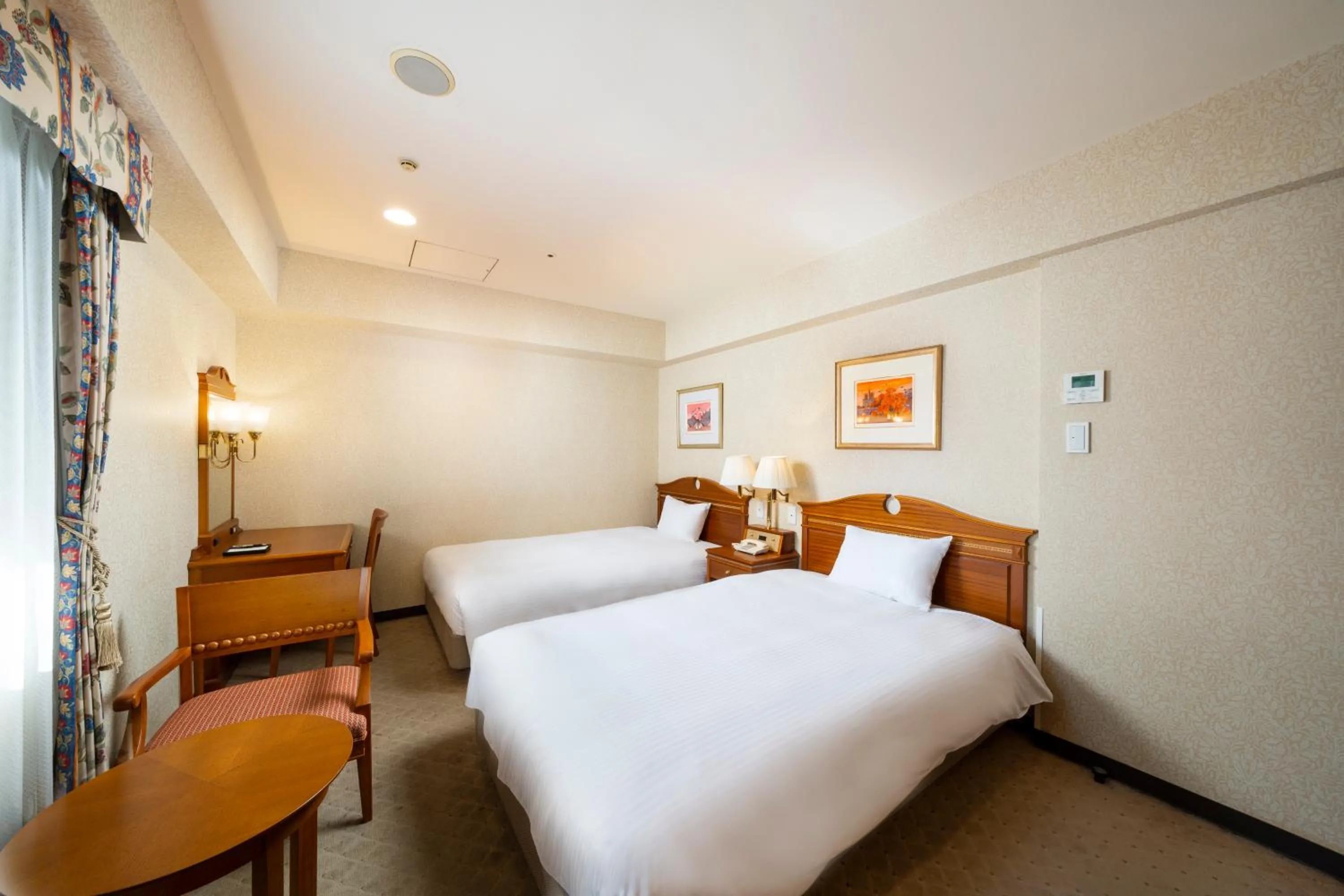 Bed in KOKO HOTEL Nagoya Sakae