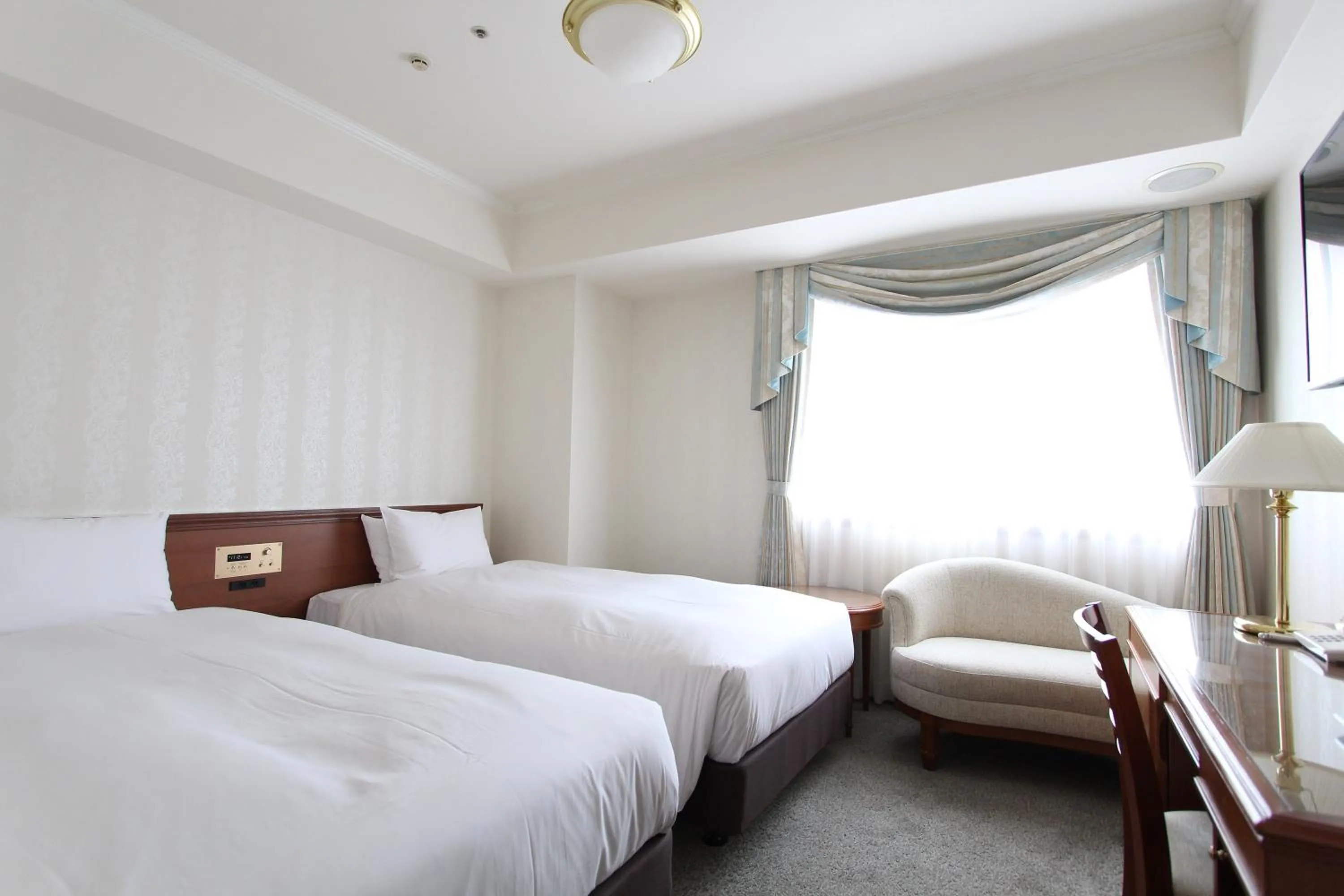 Photo of the whole room, Bed in KOKO HOTEL Osaka Shinsaibashi