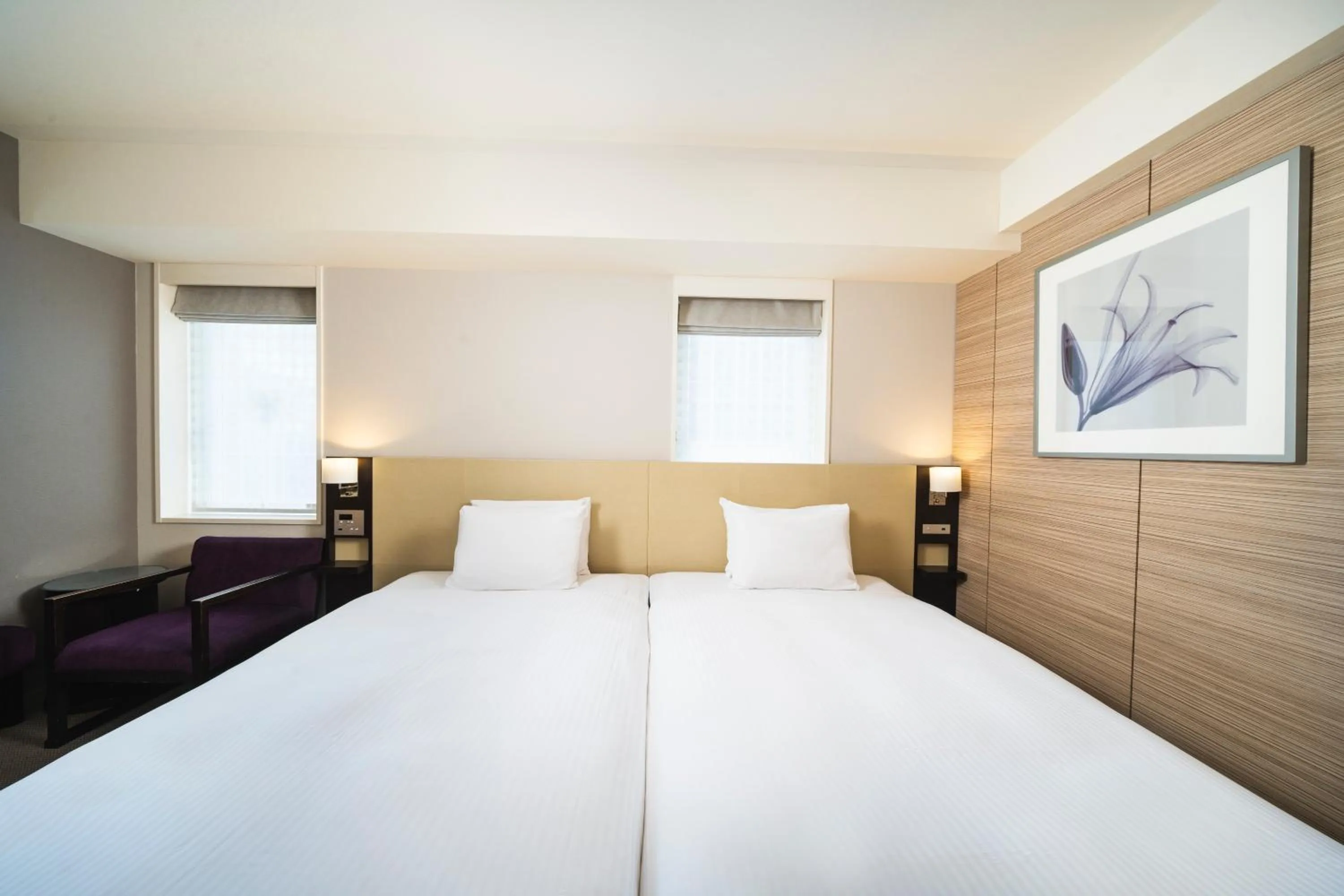 Bed in KOKO HOTEL Kobe Sannomiya