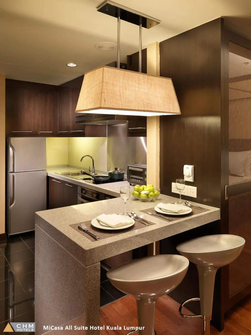 Kitchen or kitchenette in Micasa All Suites Hotel