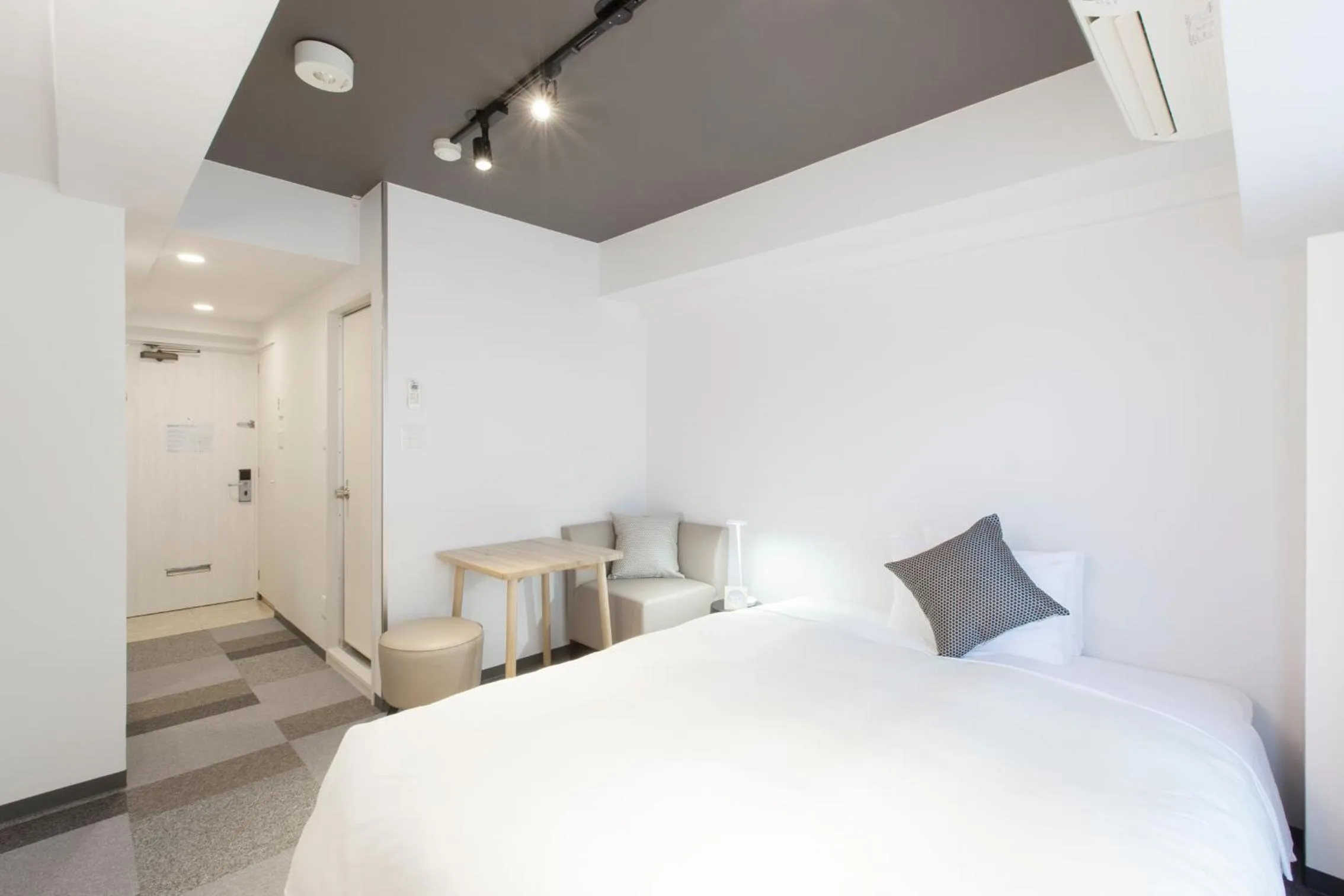 Bed in Tokyu Stay Meguro Yutenji