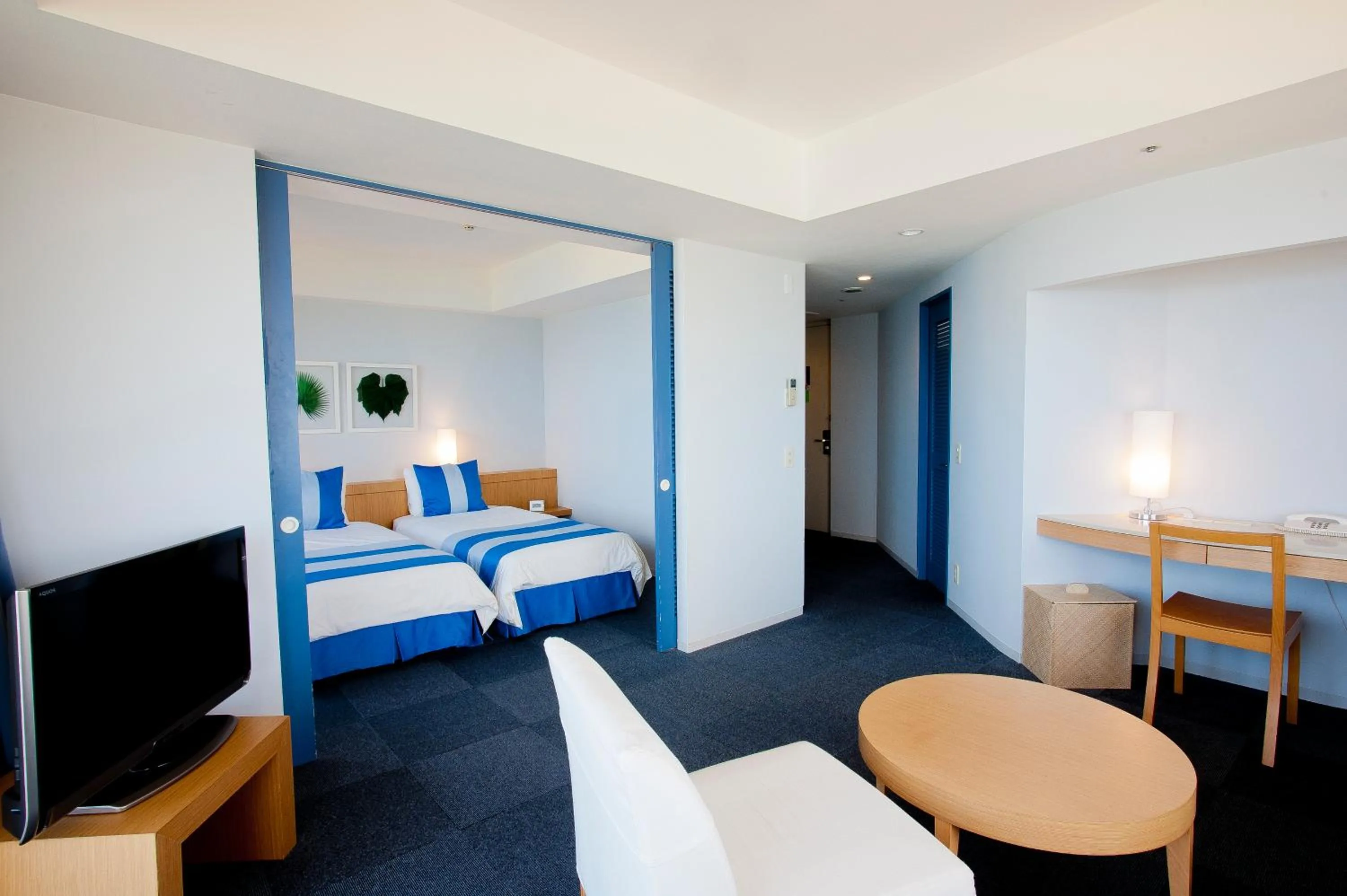 Living room, Bed in The Beach Tower Okinawa