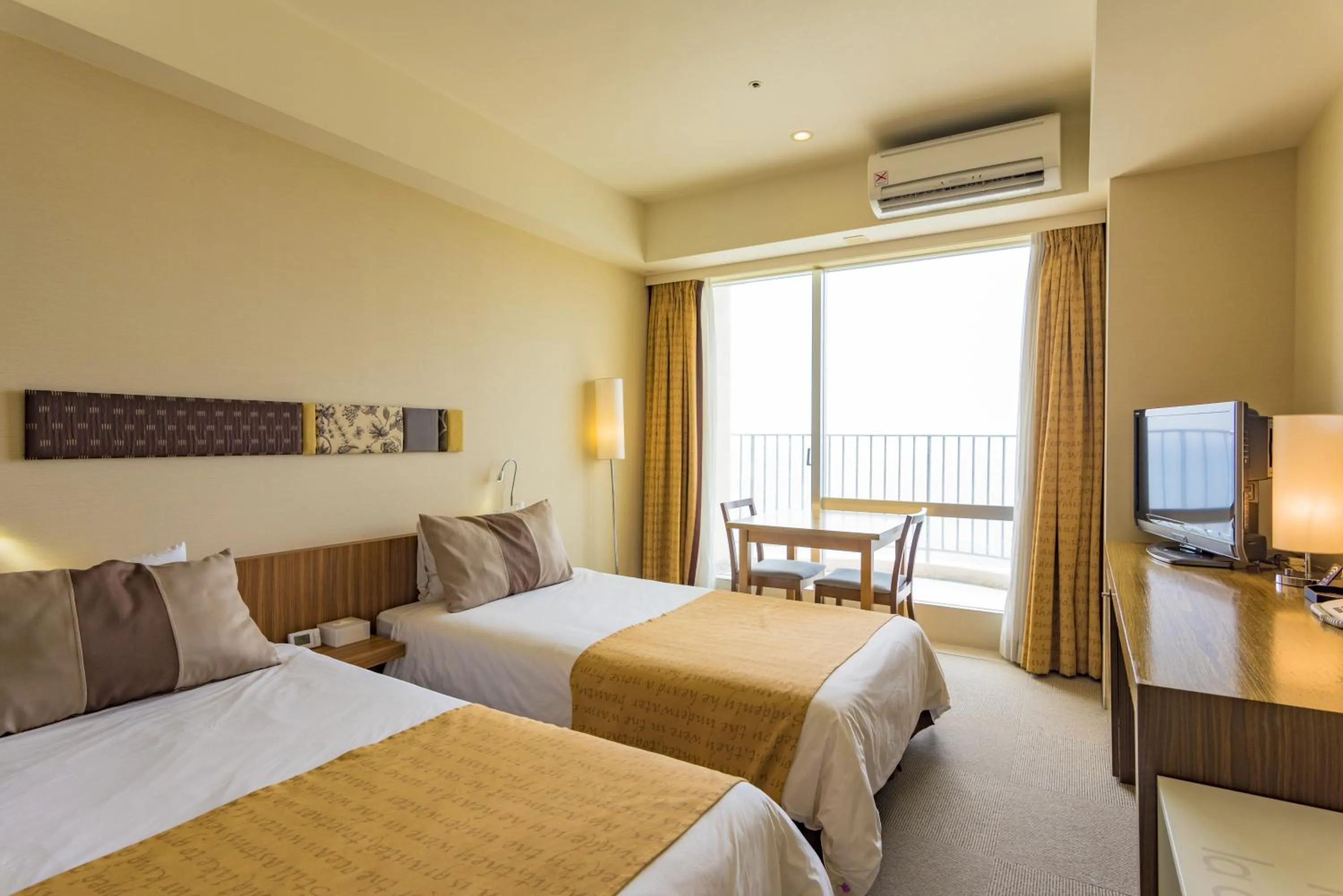 Bed in The Beach Tower Okinawa